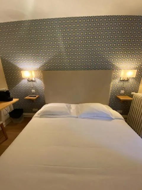 Bed in Hotel Le Central