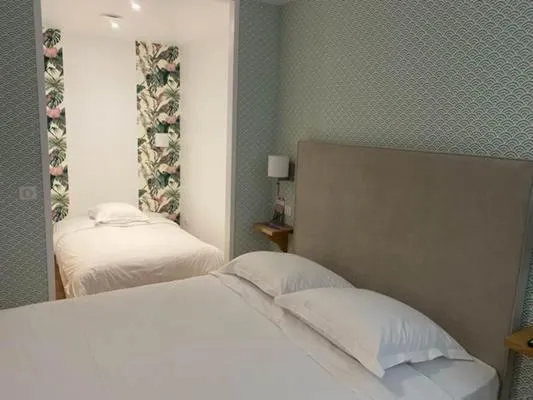 Bed in Hotel Le Central