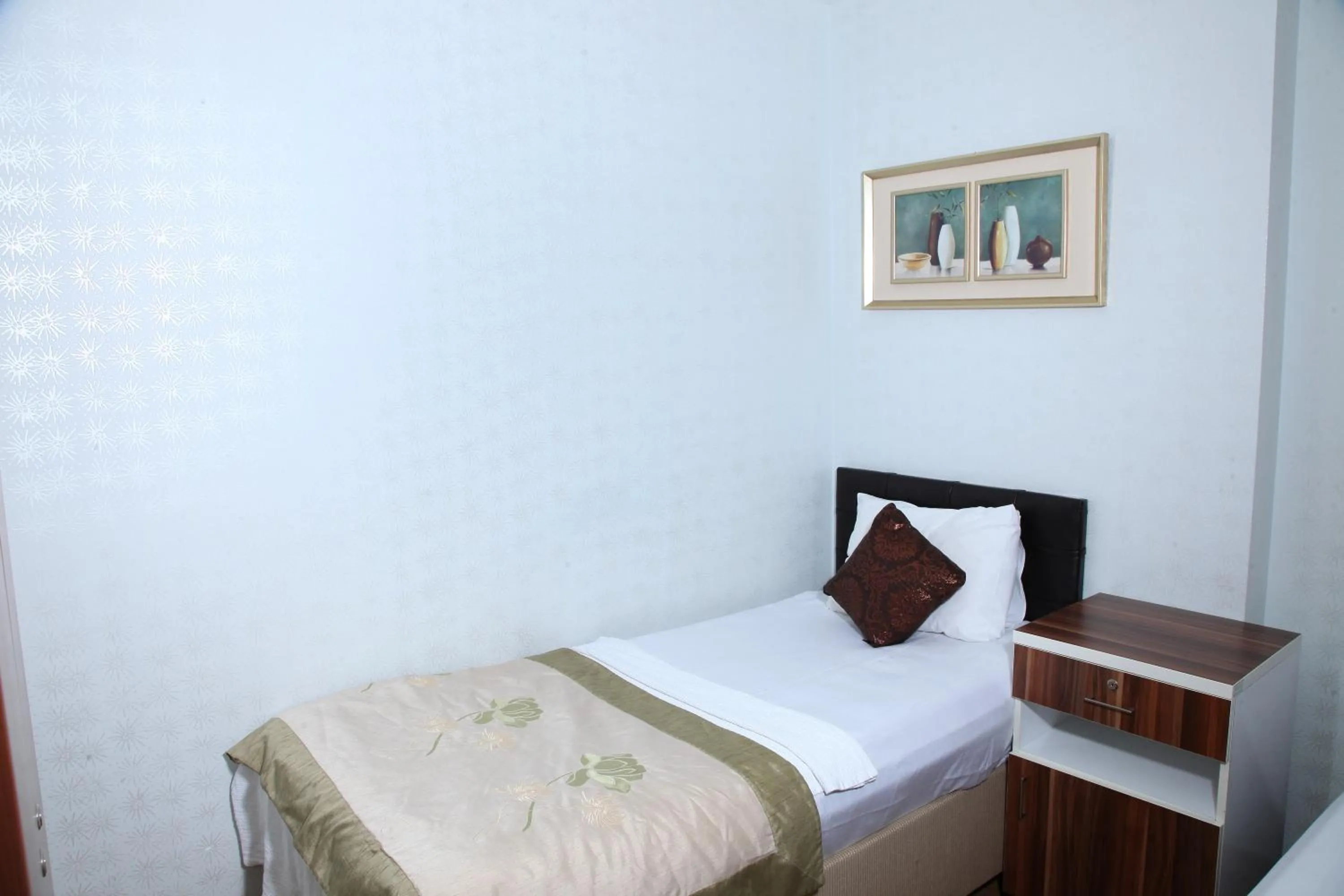 Bed in garden hill hotel