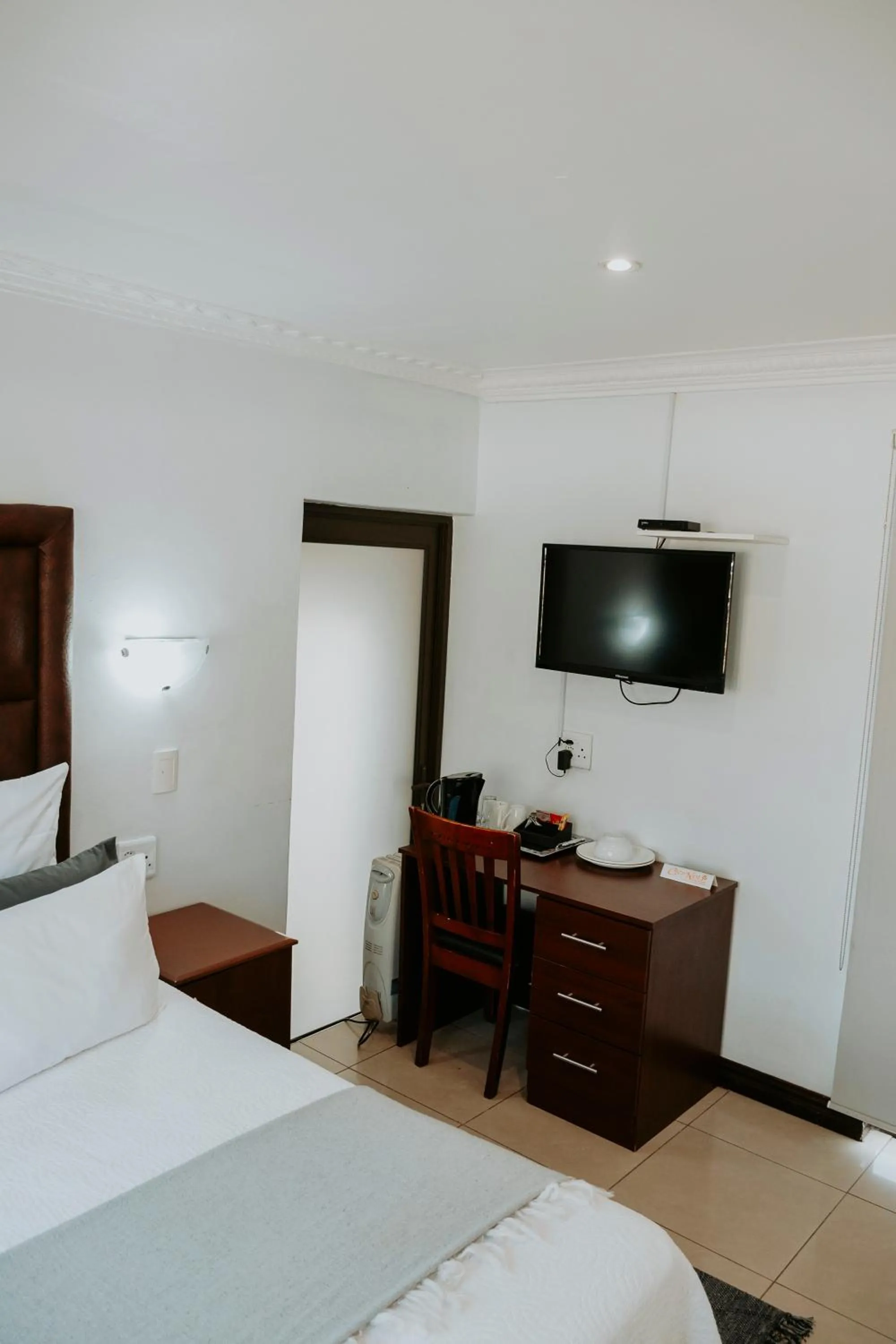 Bed in Cozy Nest Guest House Durban