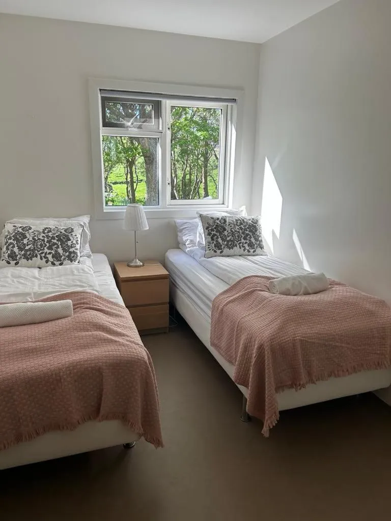 Bed in Syðra-Skörðugil Guesthouse