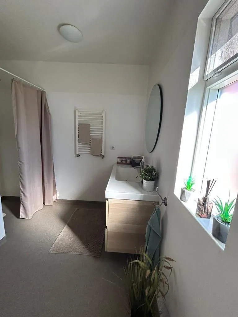 Bed in Syðra-Skörðugil Guesthouse