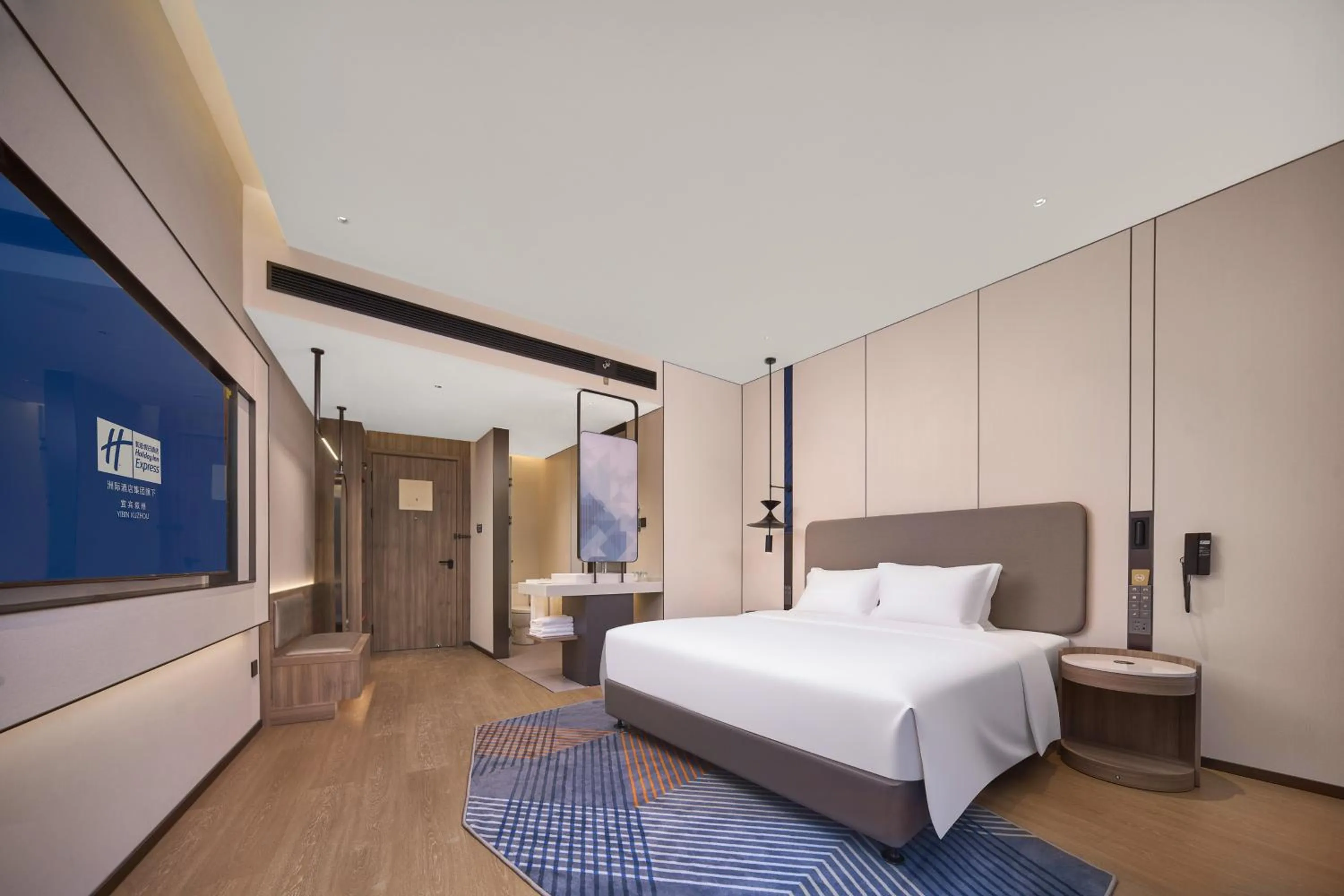 Bed in Holiday Inn Express Yibin Xuzhou by IHG