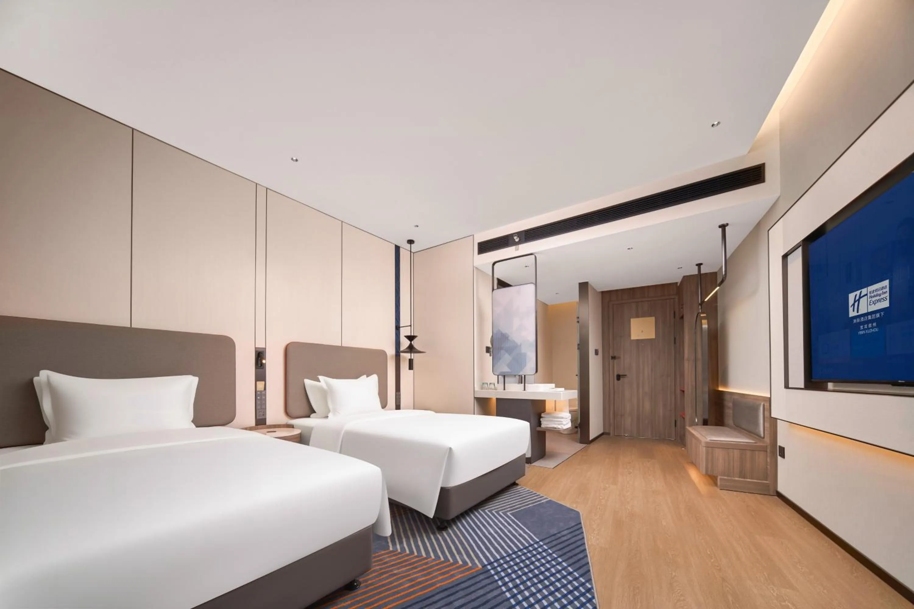Bed in Holiday Inn Express Yibin Xuzhou by IHG