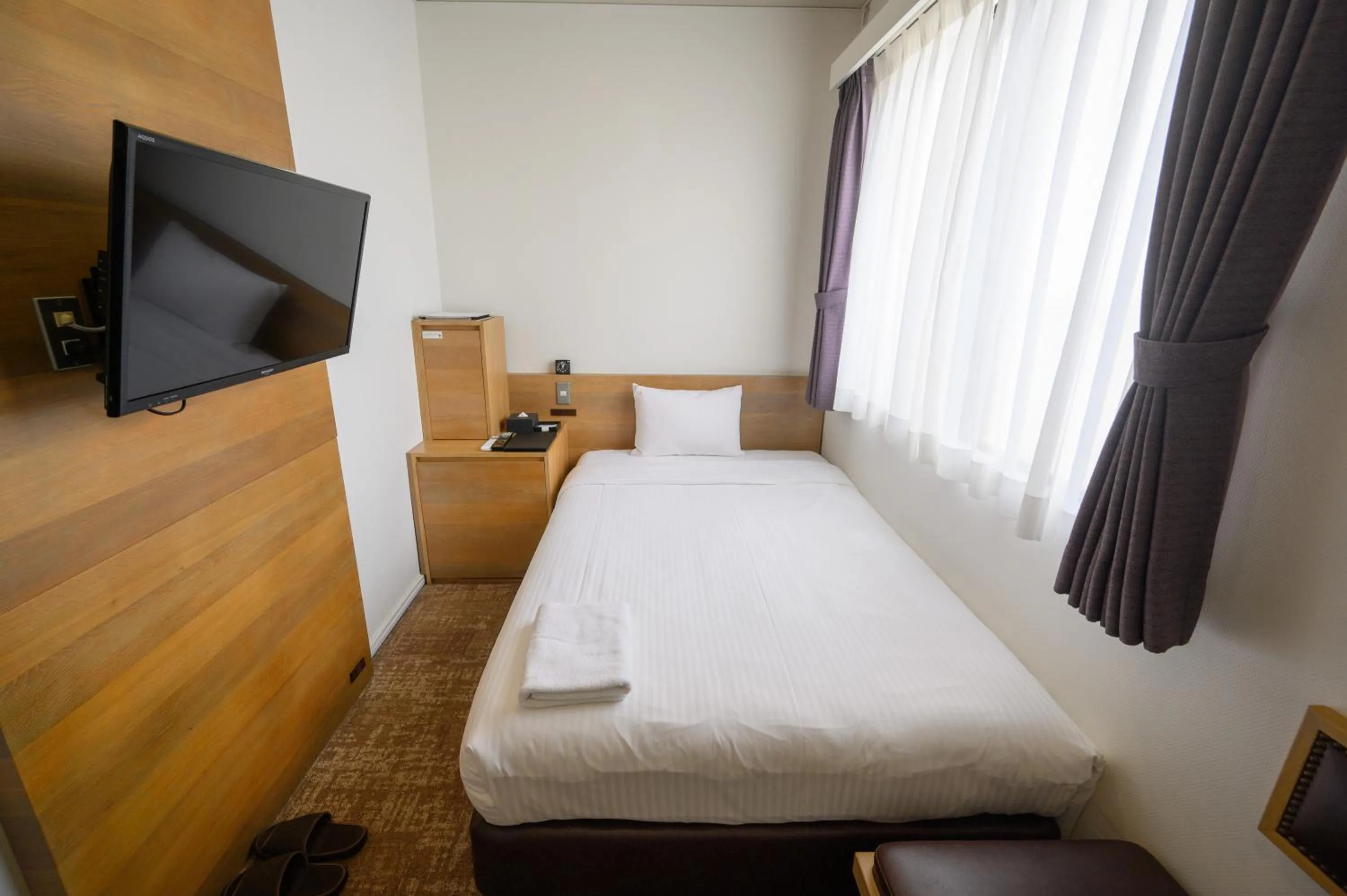 Photo of the whole room, Bed in Hotel Emerald Isle Ishigakijima