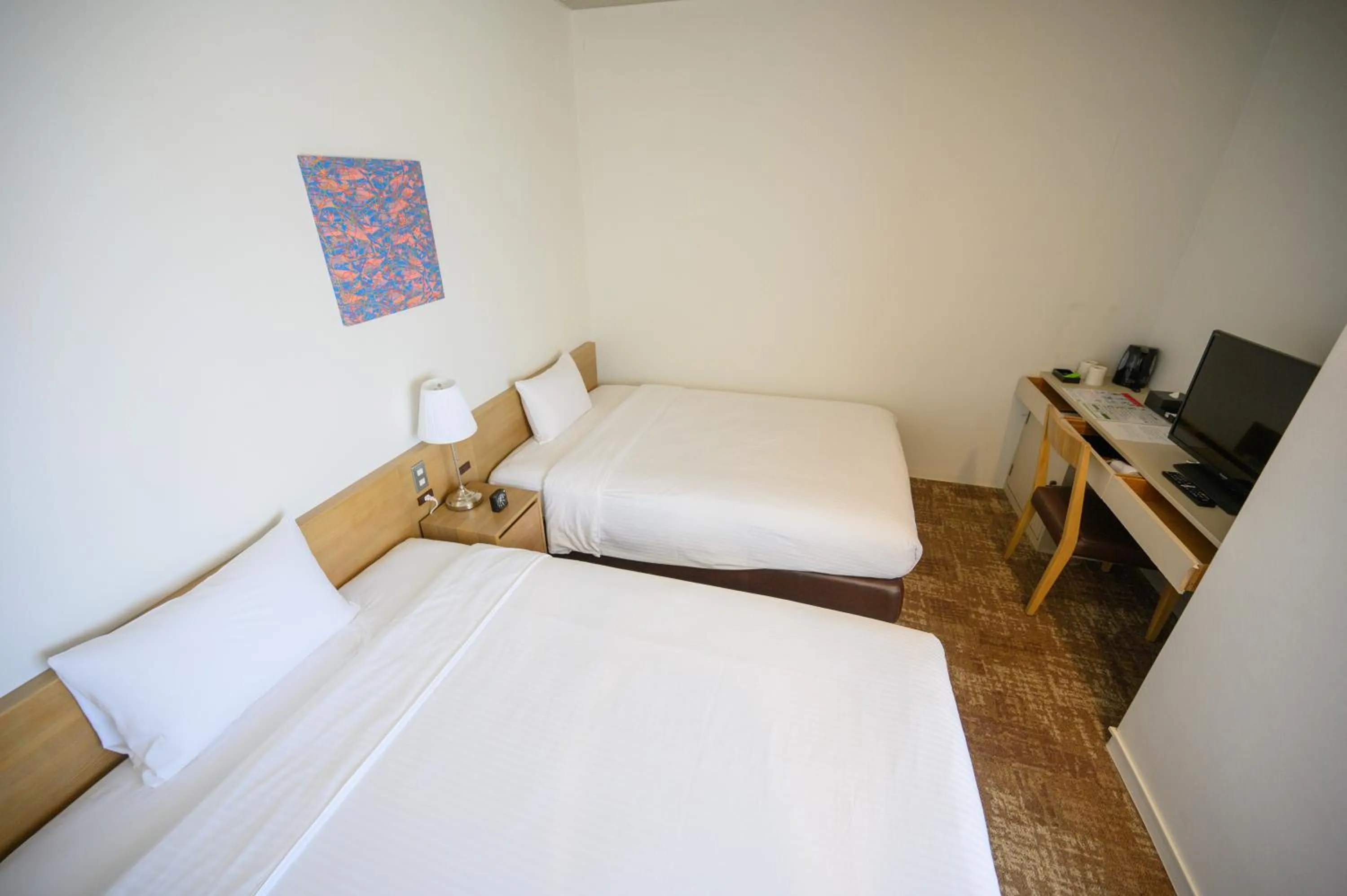 Photo of the whole room, Bed in Hotel Emerald Isle Ishigakijima