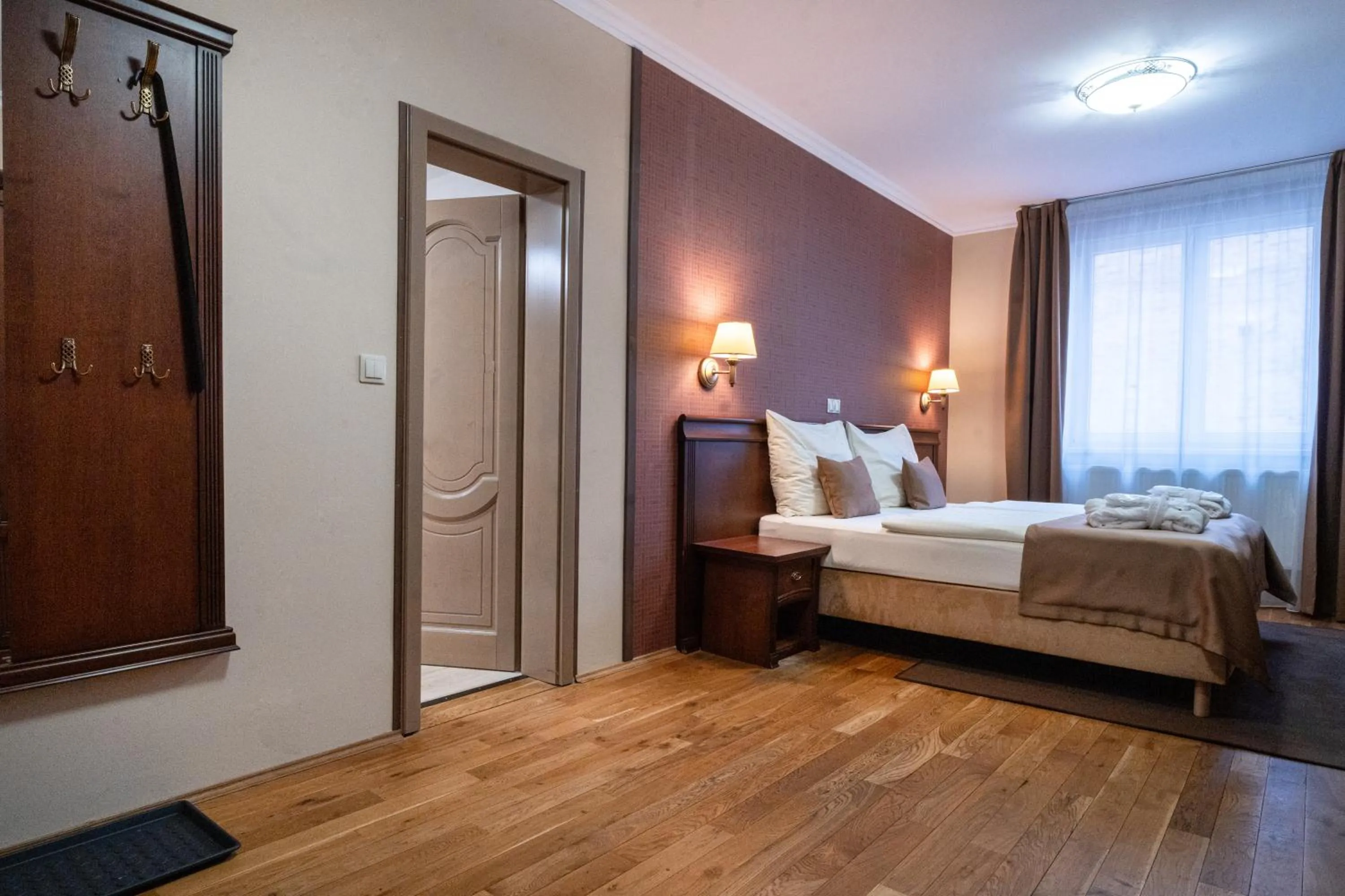 Bed in Wellness Hotel Pivovar Monopol