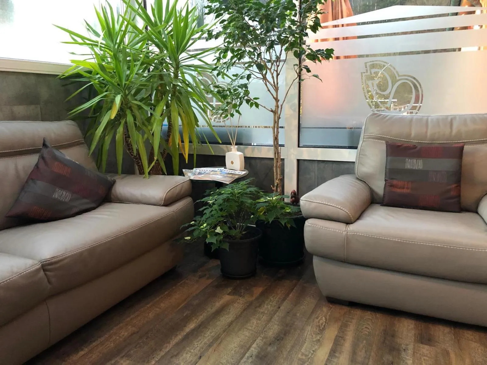 Communal lounge/ TV room in Appart-Hotel Gwendy