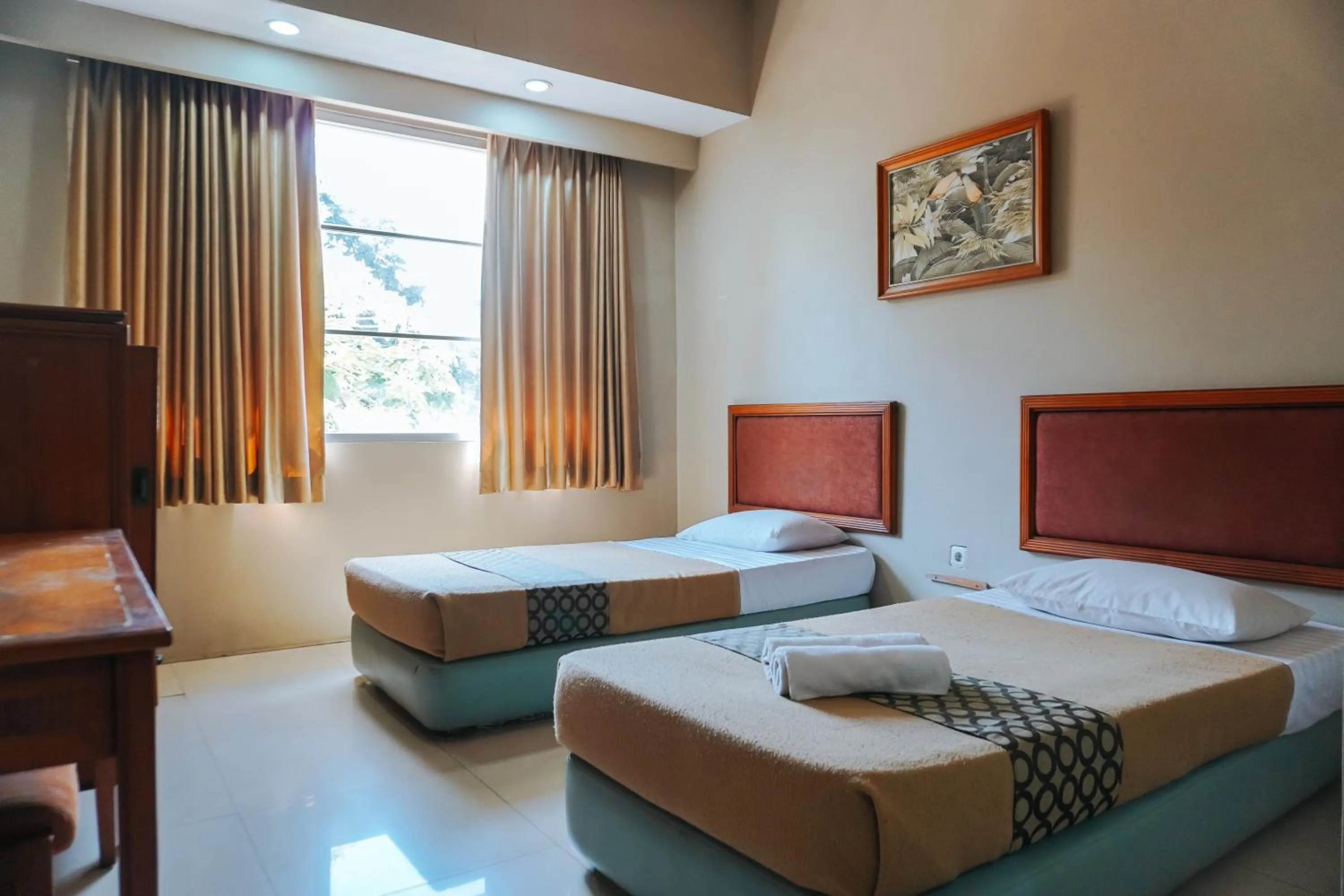 Bed in Hotel Wisma Dago