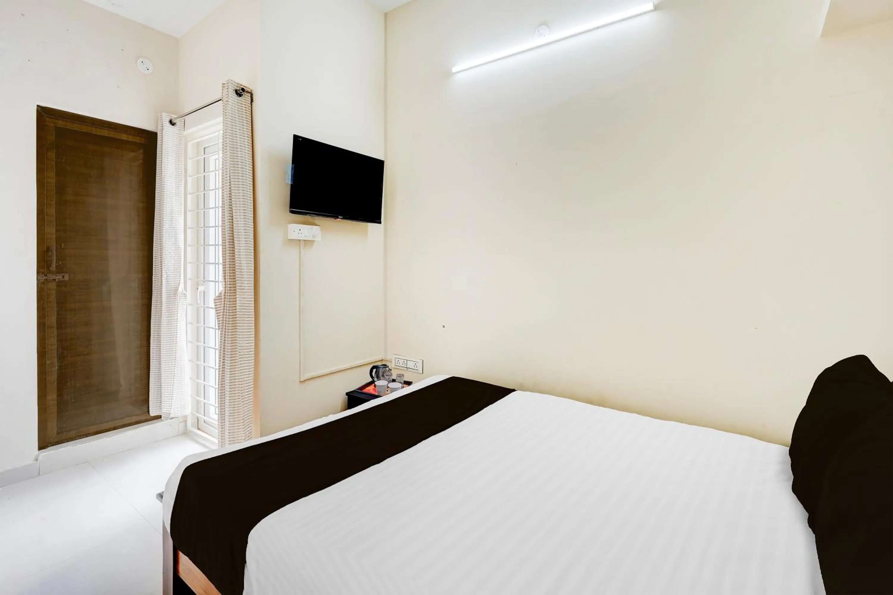 Bedroom in Super Collection O Sholinganallur Chennai Formerly Nimalan Residenc