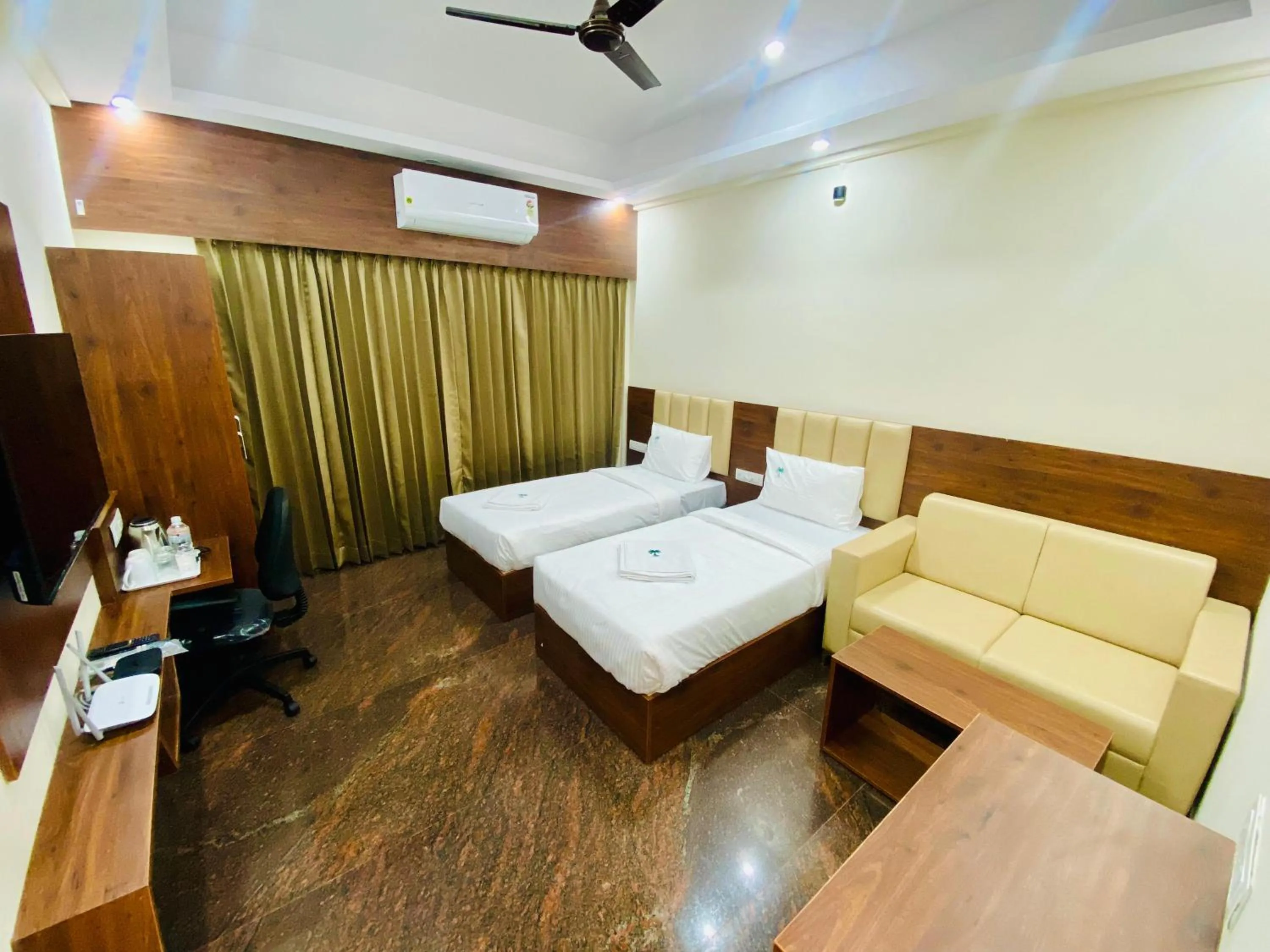 Bed in Hotel Sahara Tree