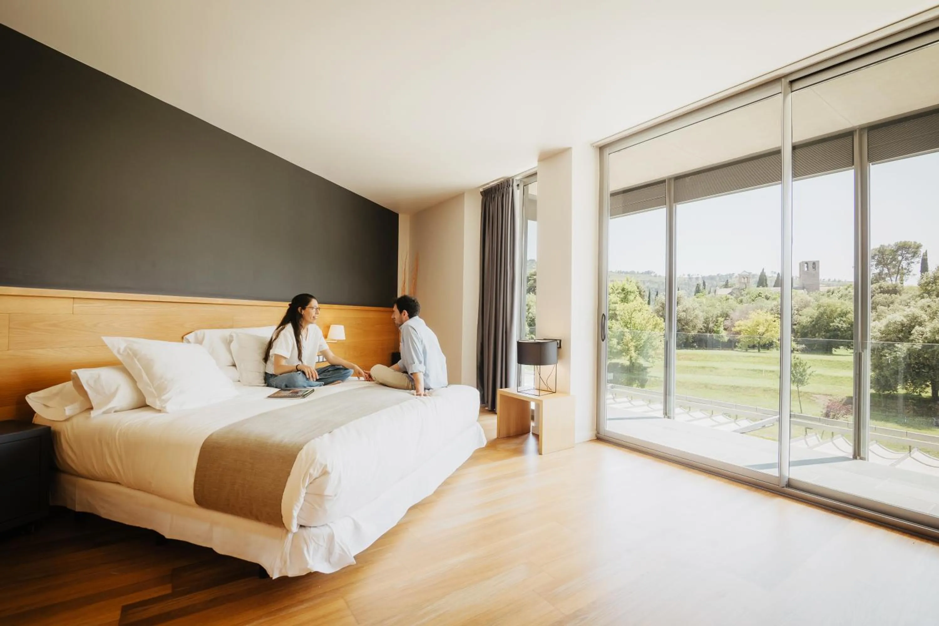 Bed in Hotel Món Sant Benet