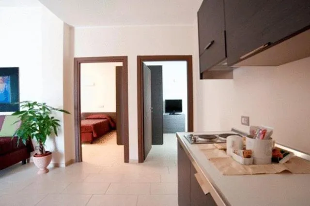 Living room, Bed in Hotel Massimino