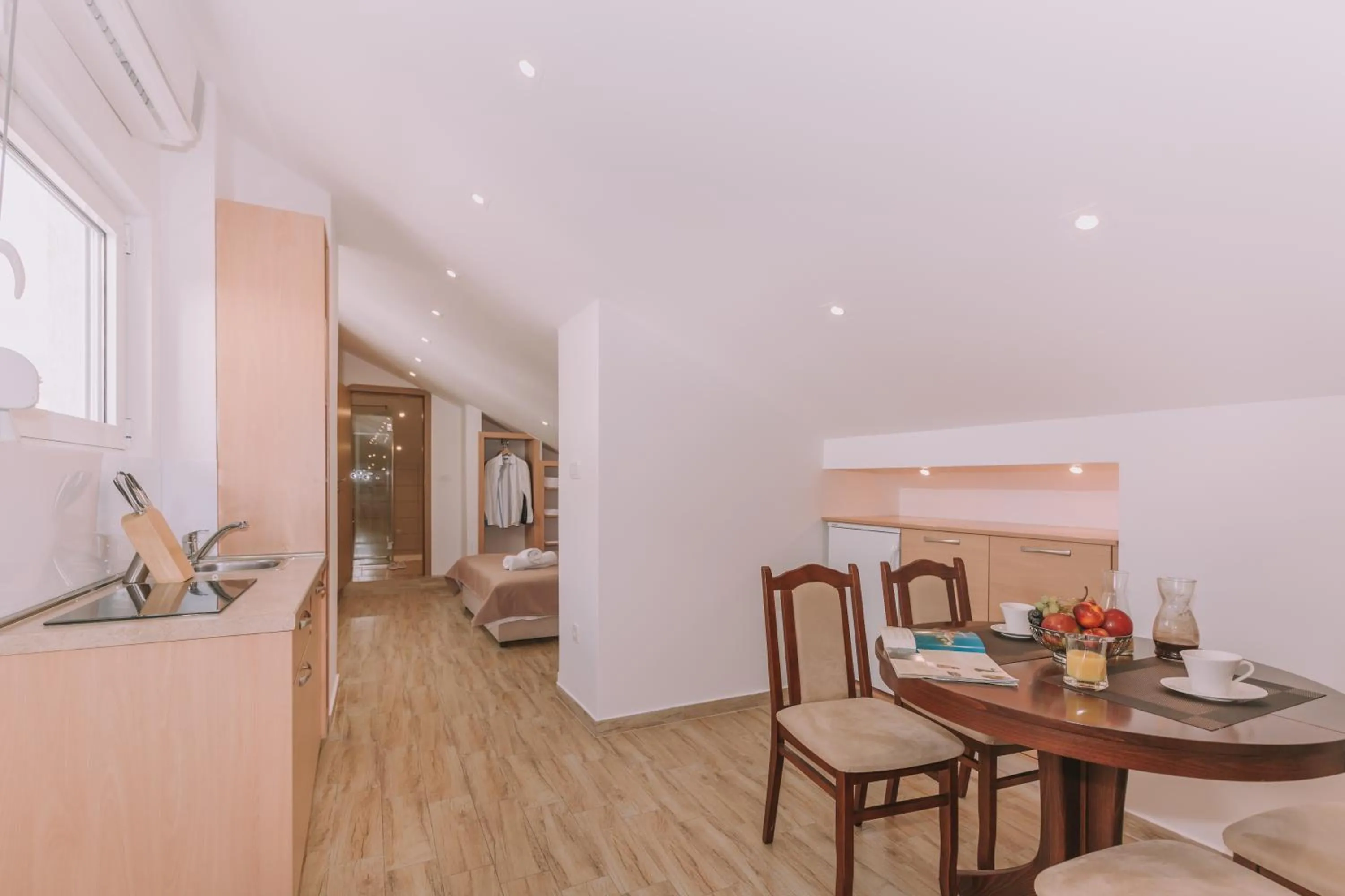 Kitchen or kitchenette, Bed in City Apartments