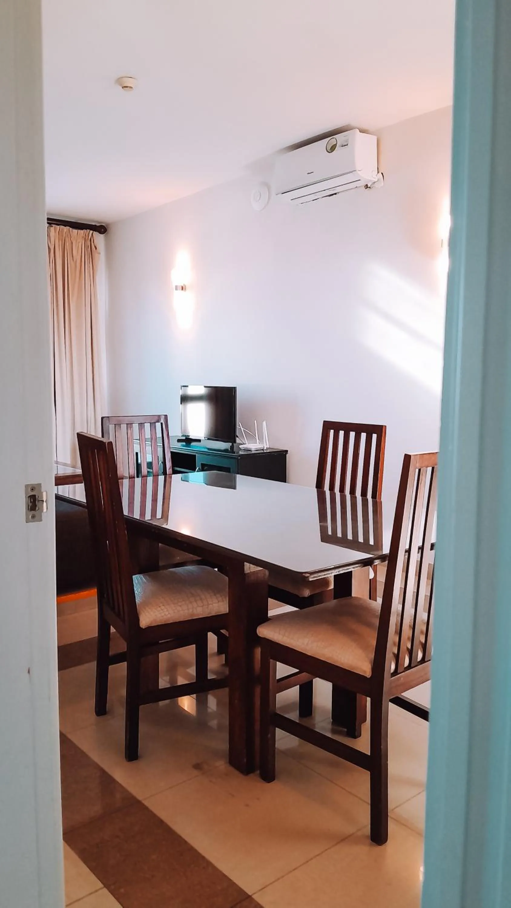 Communal lounge/ TV room in Vip Executive Suites Maputo