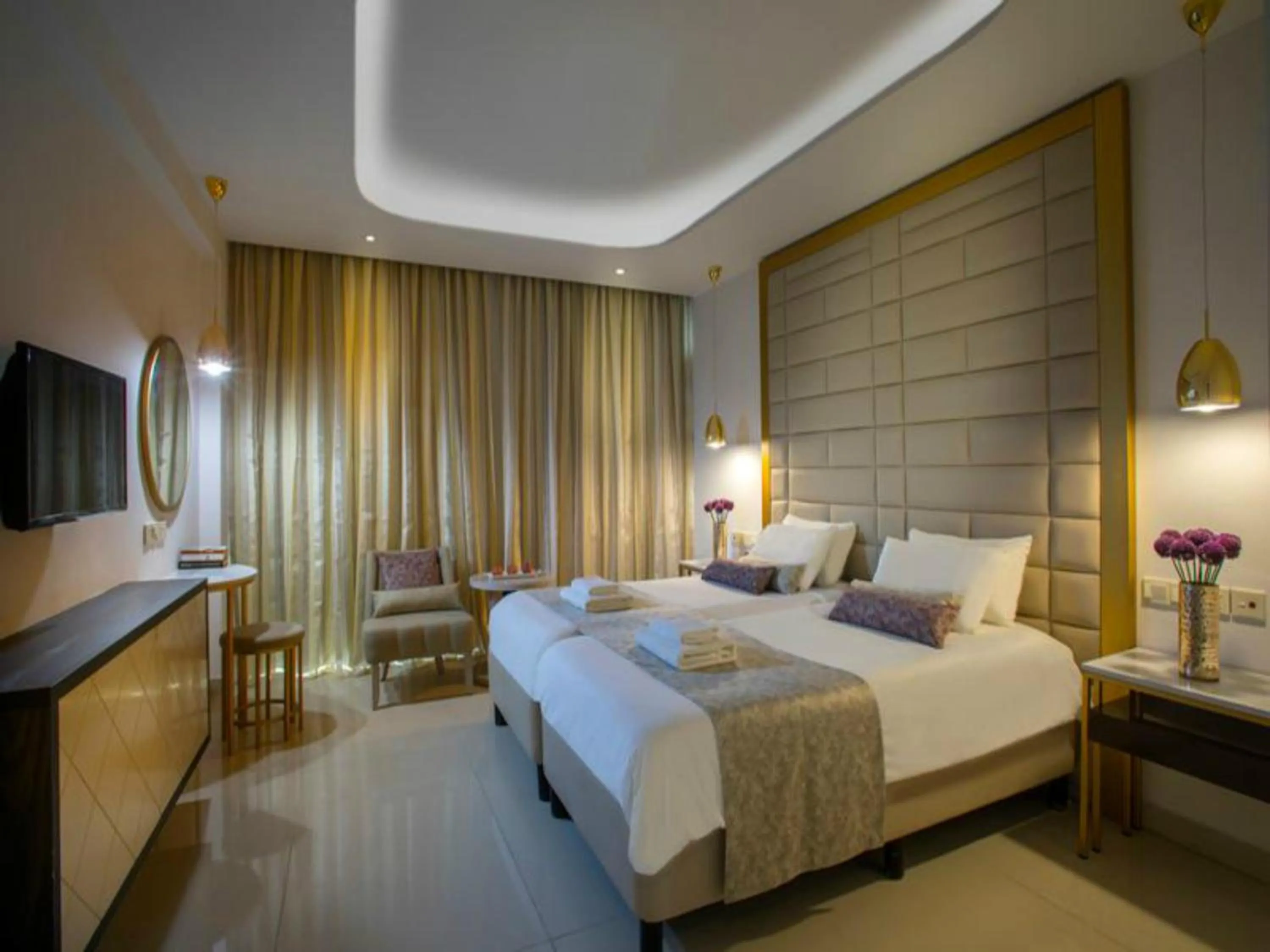 Bed in Constantinos the Great Beach Hotel