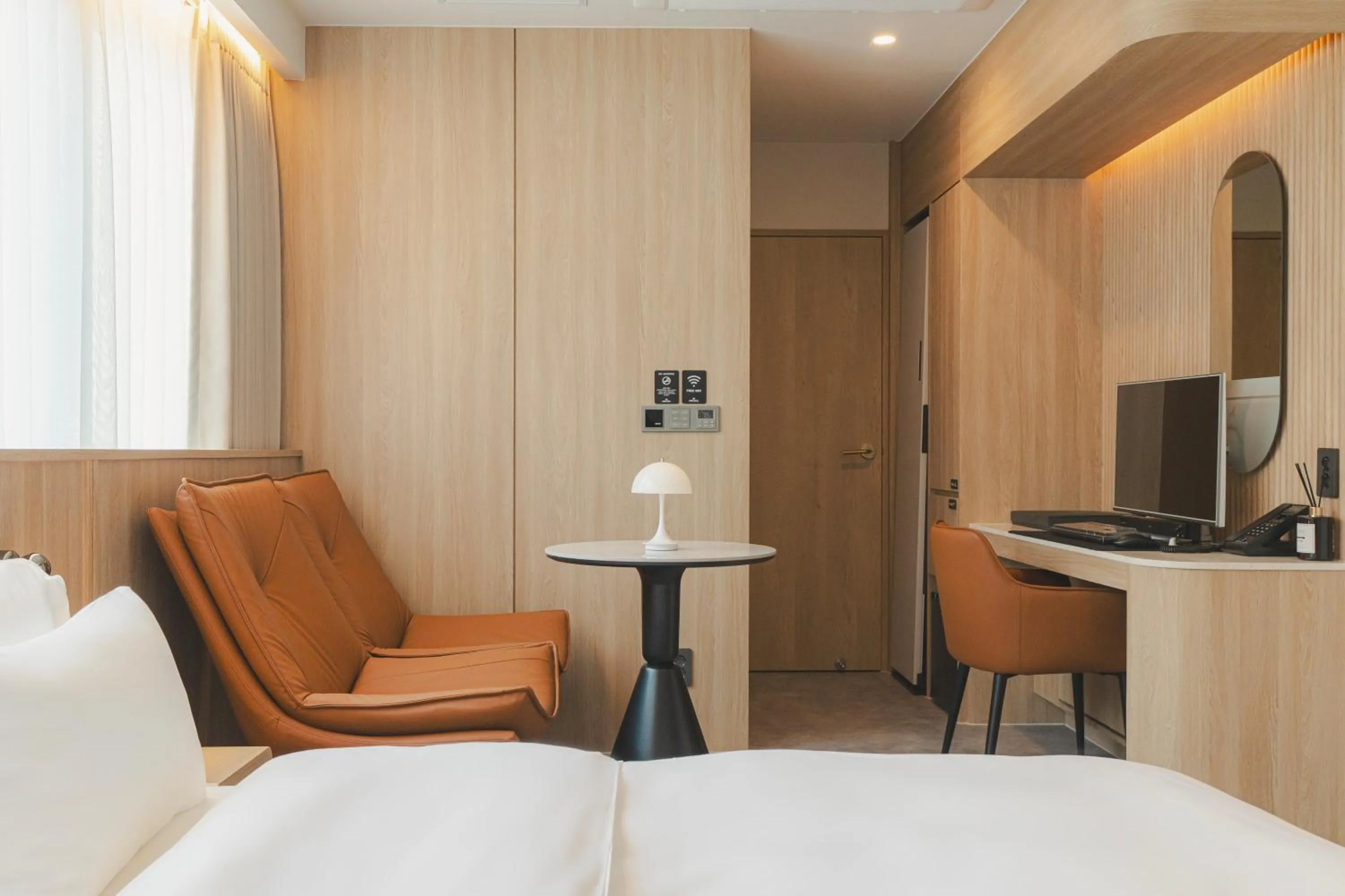 Seating area, Bed in Cheonan Buldang Hound Hotel