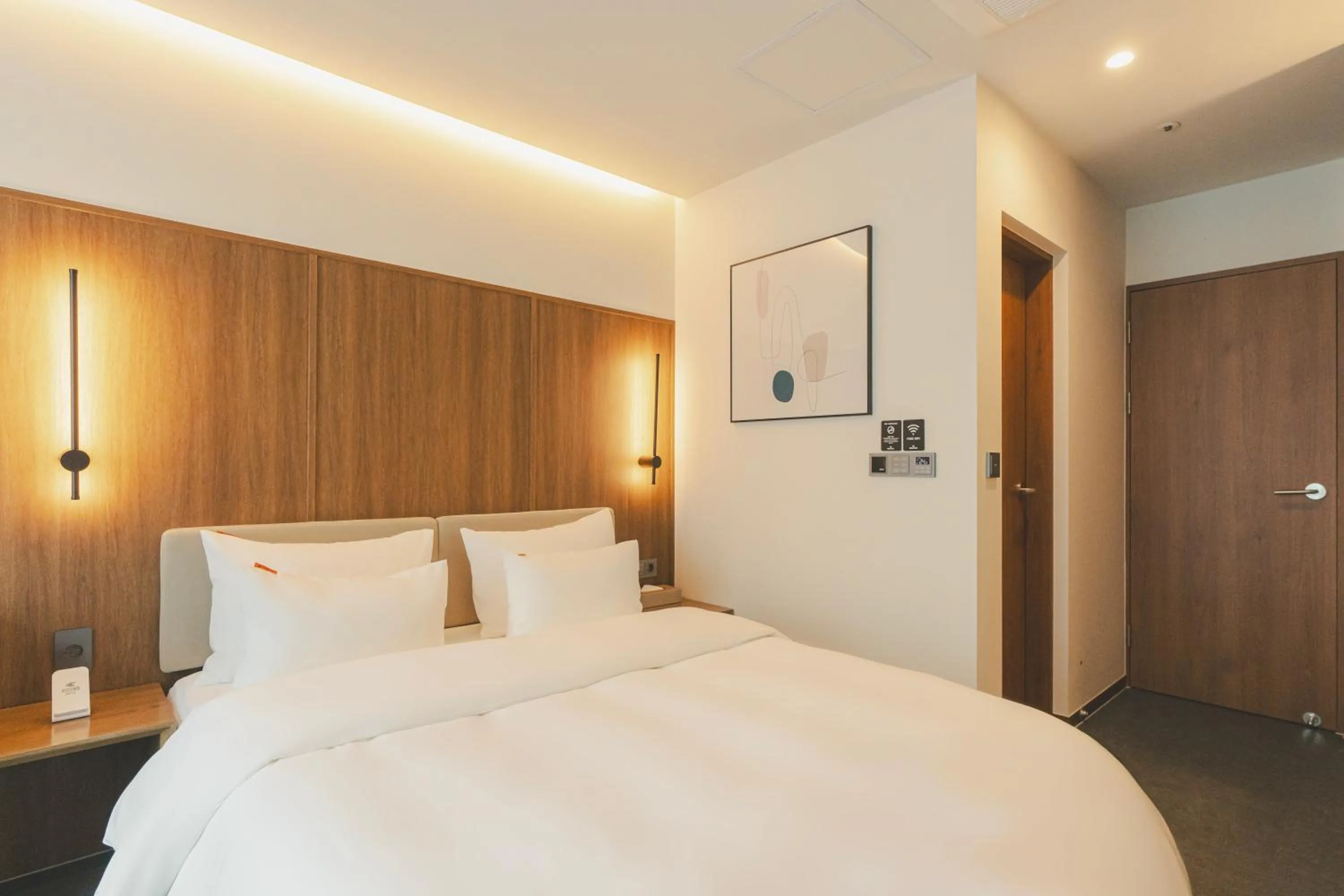 Bed in Cheonan Buldang Hound Hotel