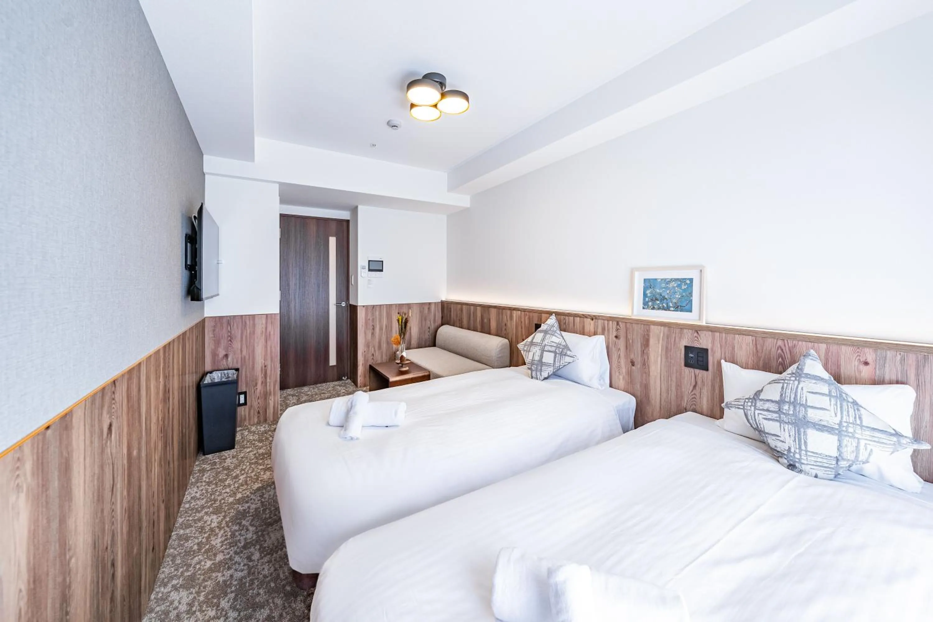 Bed in Apartment Hotel 11 Osaka Dome