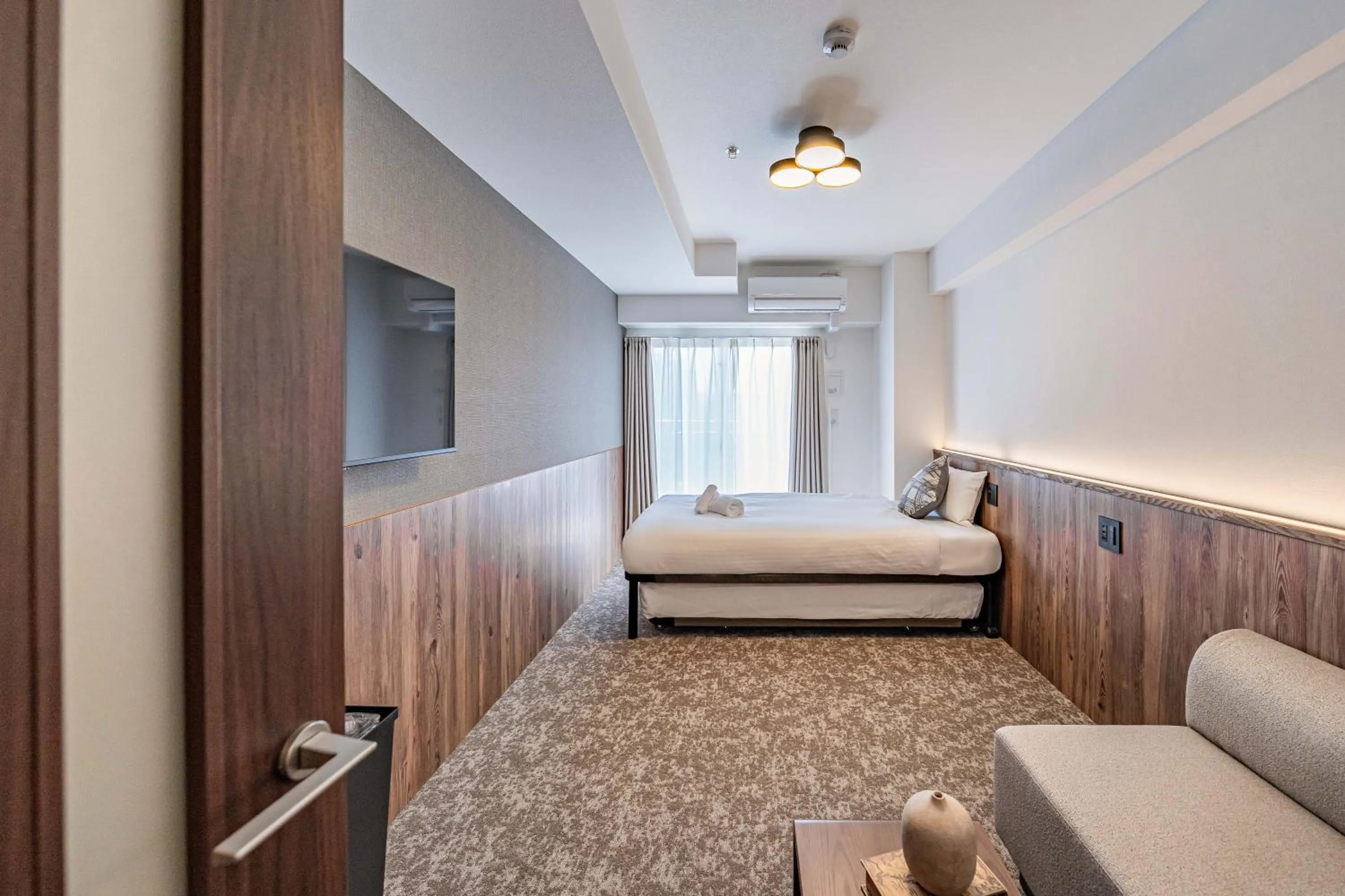 Bed in Apartment Hotel 11 Osaka Dome