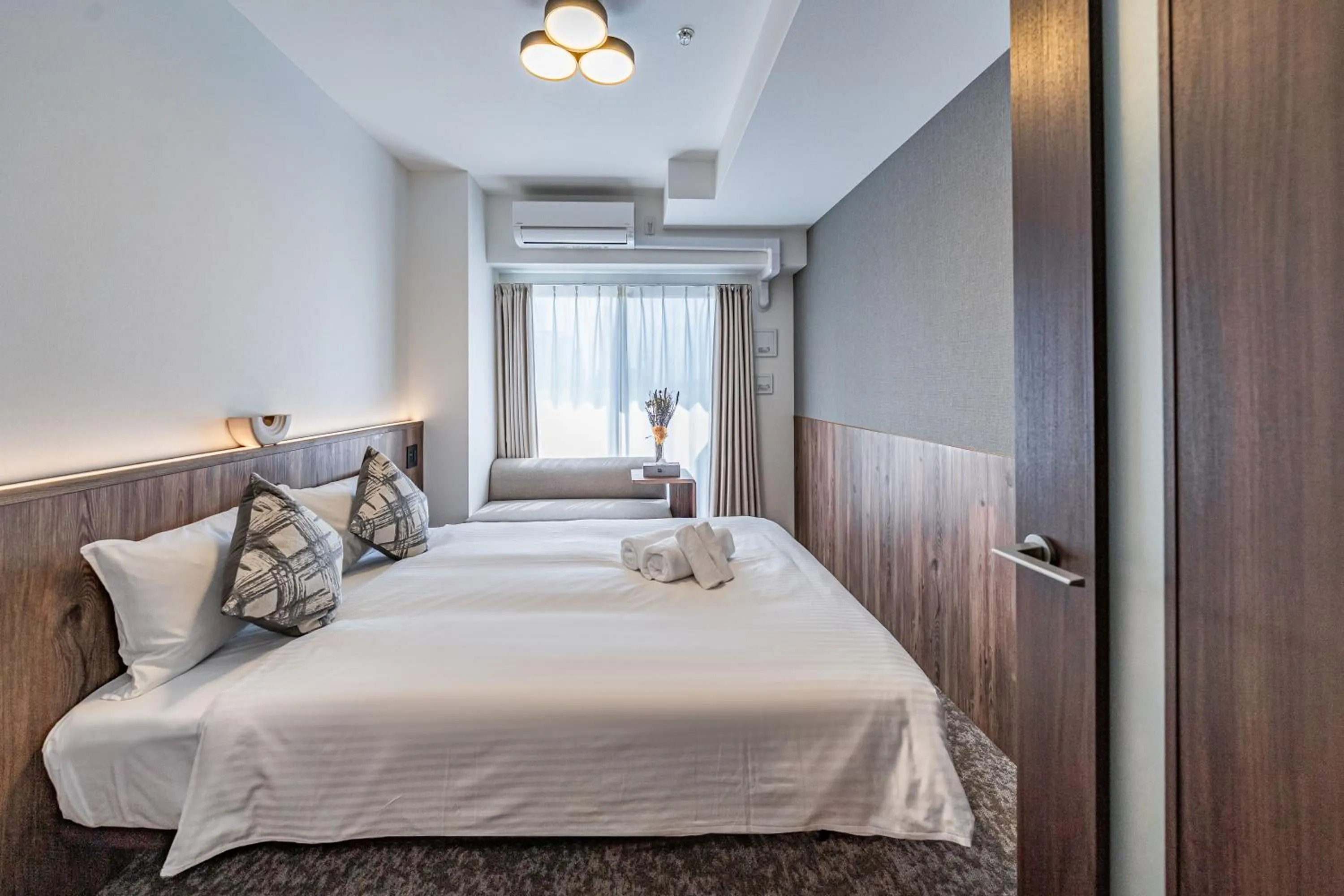 Bed in Apartment Hotel 11 Osaka Dome