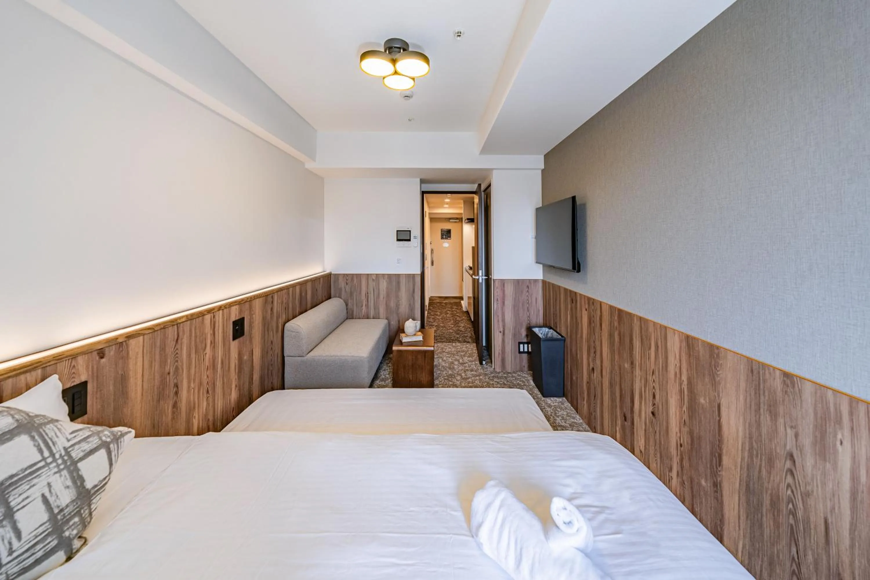 Bed in Apartment Hotel 11 Osaka Dome