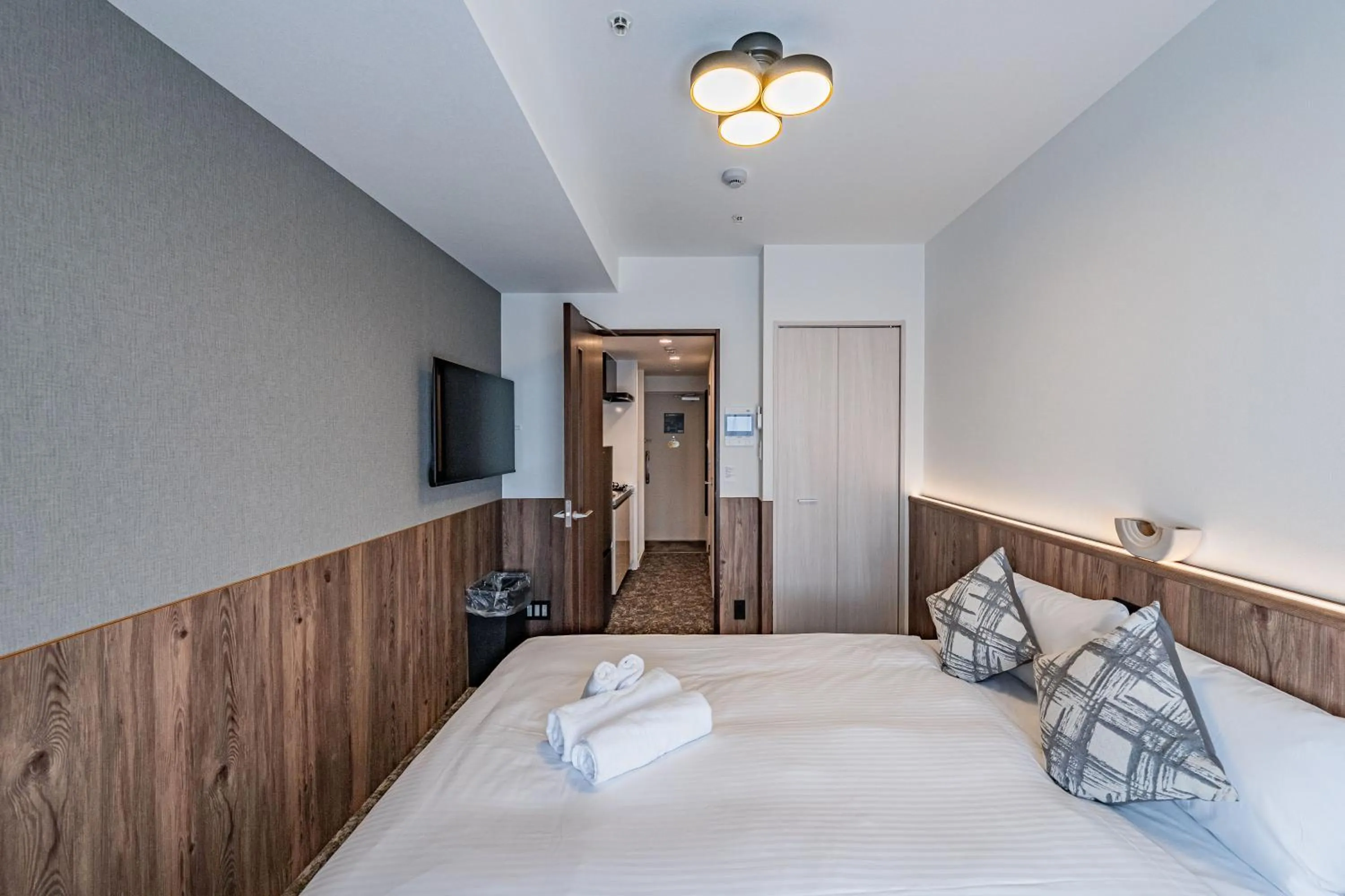 Bed in Apartment Hotel 11 Osaka Dome