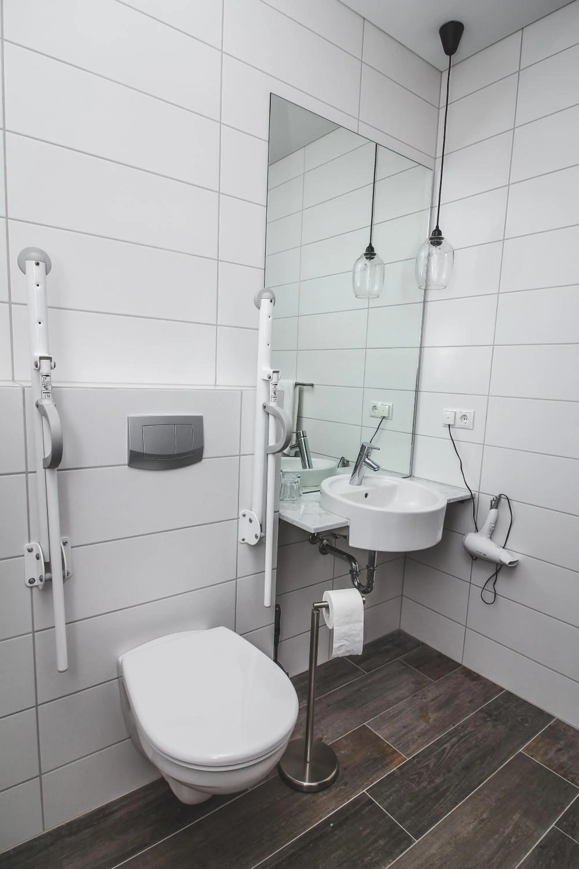 Bathroom in Bella Apartments & Rooms