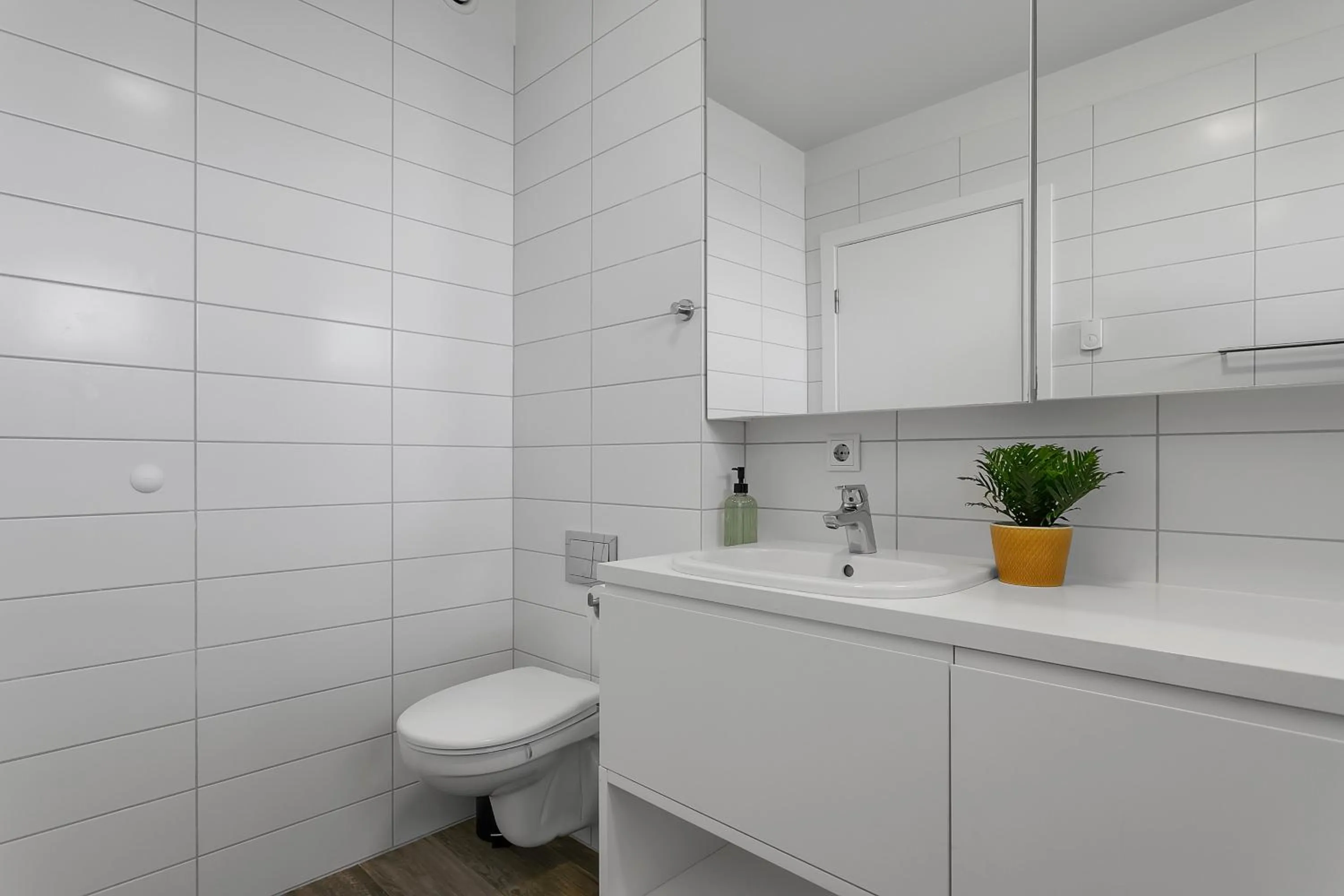 Toilet in Bella Apartments & Rooms