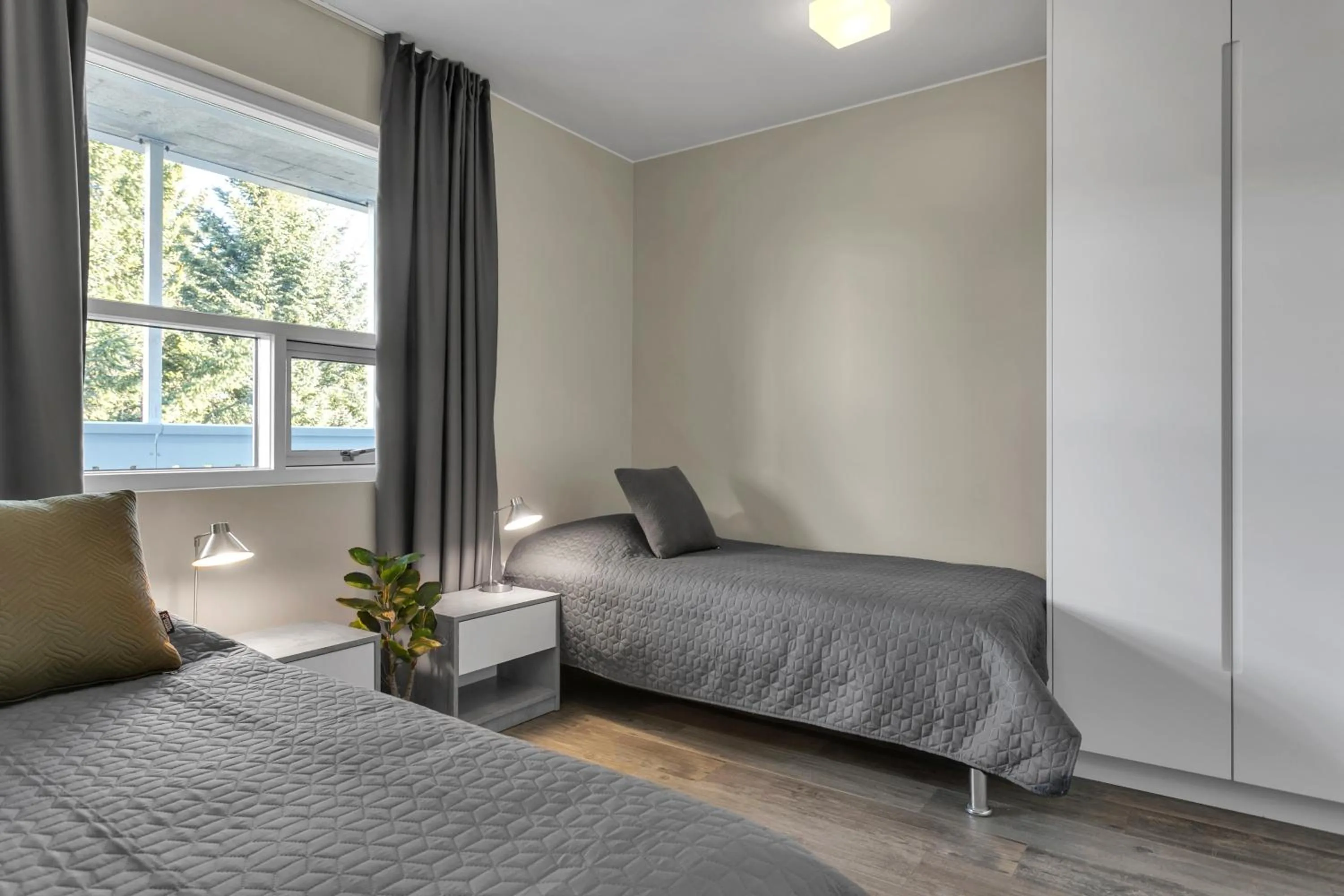 Bed in Bella Apartments & Rooms