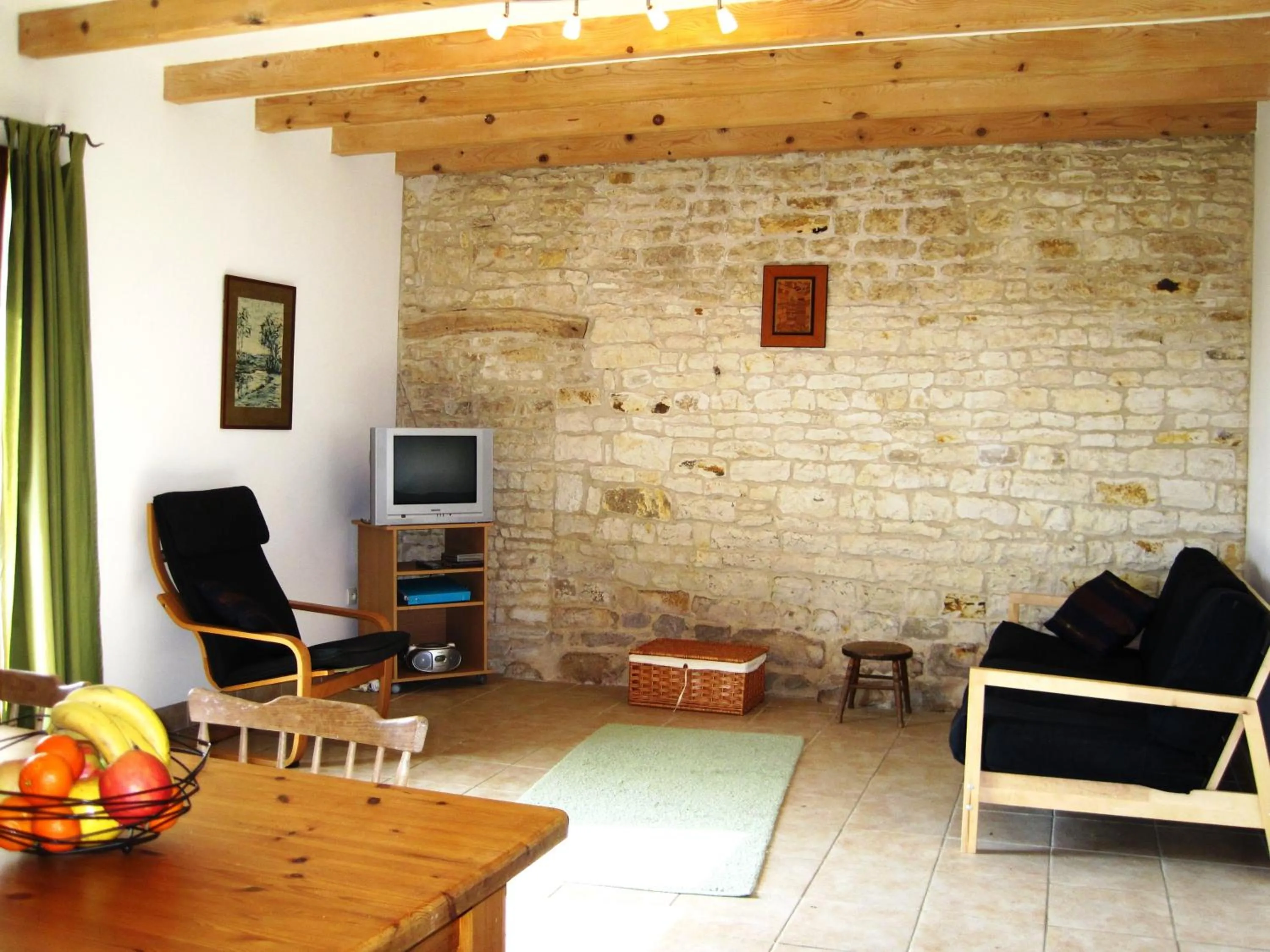 TV and multimedia in Le Noisetier at Les Hiboux Gites