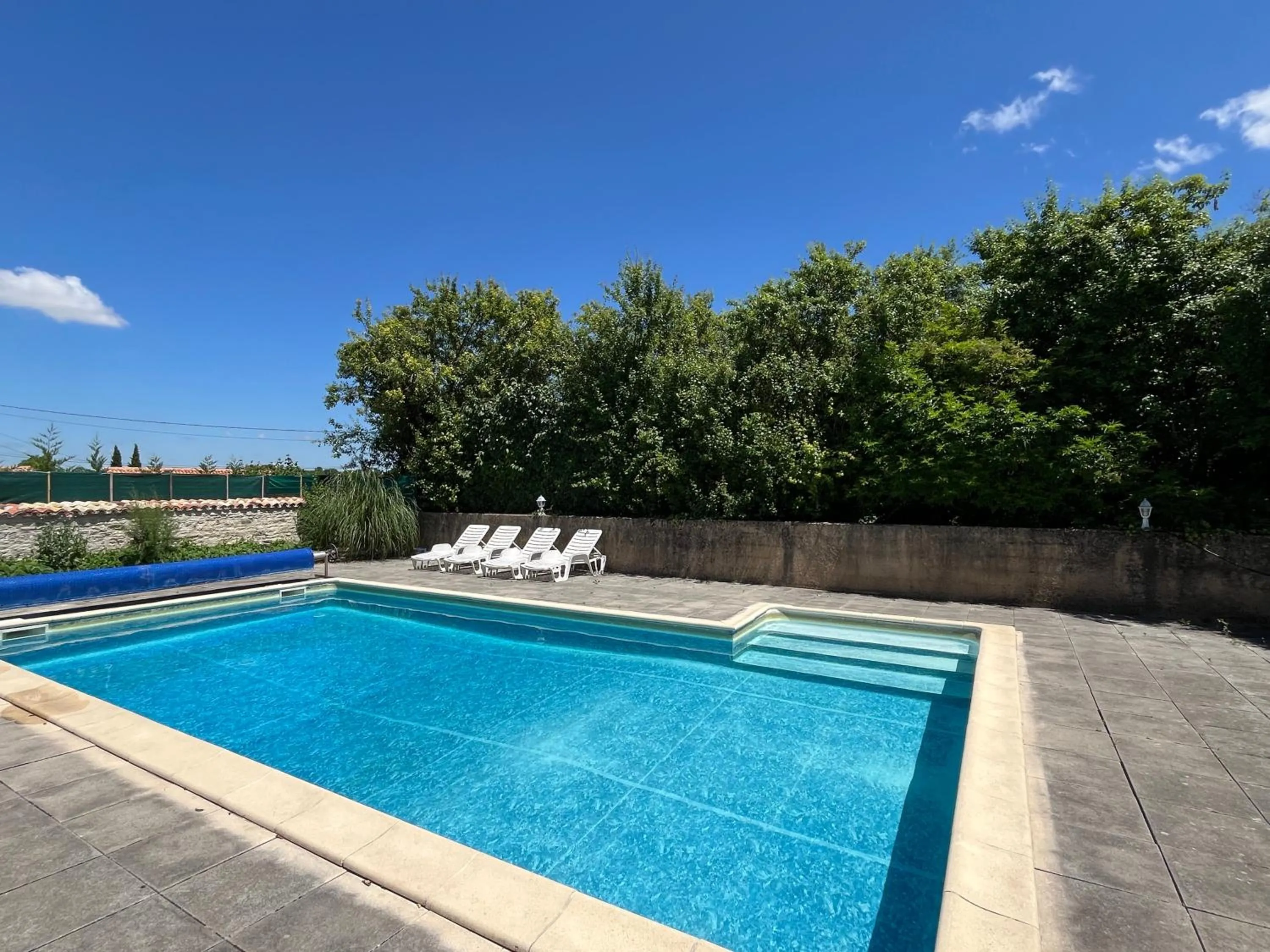 Pool view in Le Noisetier at Les Hiboux Gites