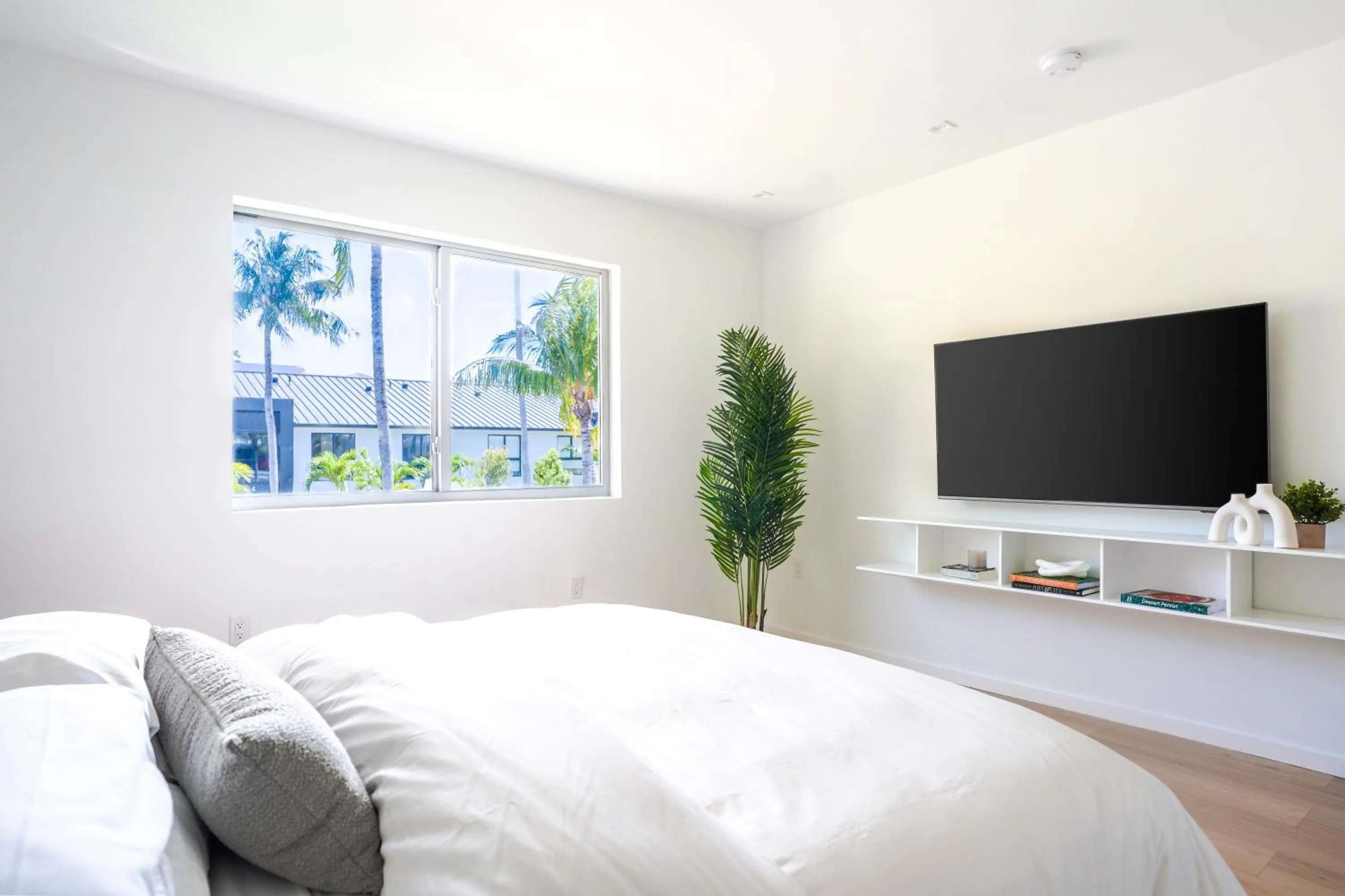 Bed in Beach Haus Key Biscayne Contemporary Apartments