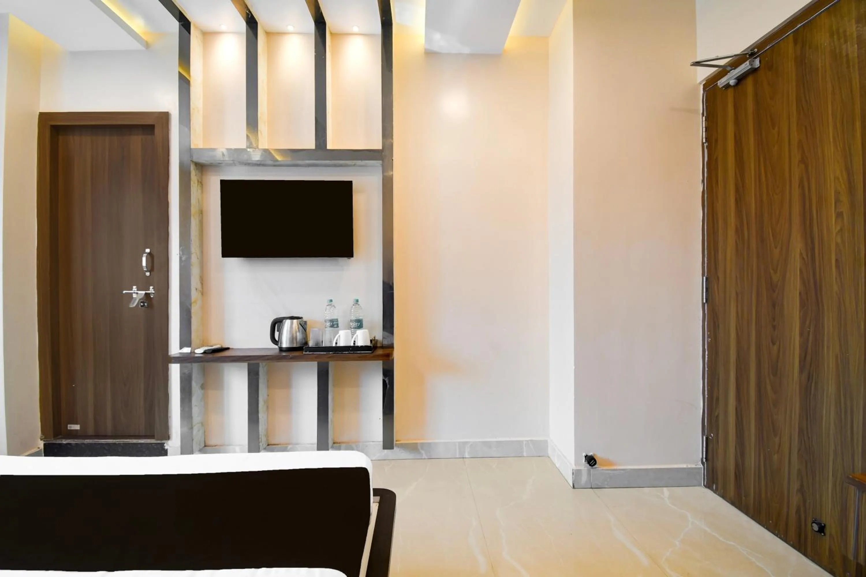 Bedroom in Super Townhouse Puri Formerly Hotel Narashingha