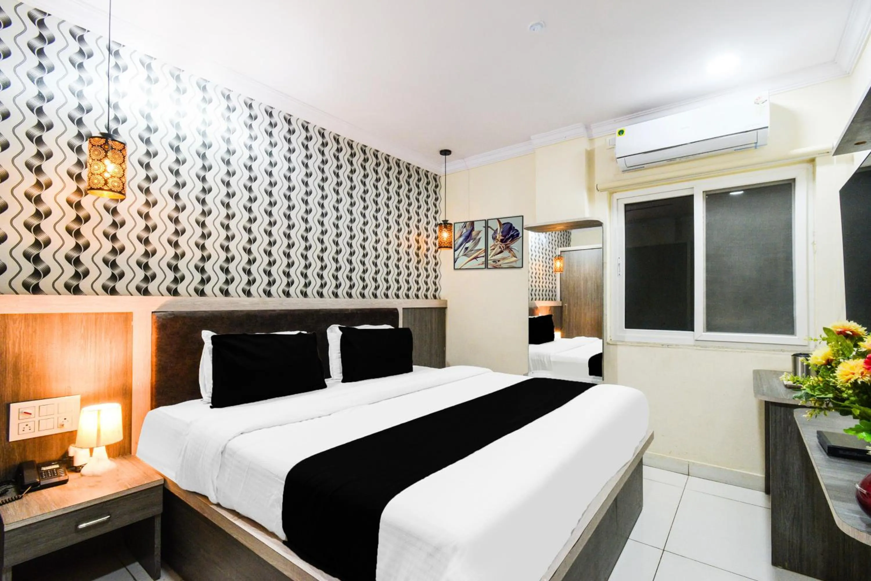 Bedroom, Bed in Townhouse Shamshabad Paradise Formerly Blue Petals Hotel