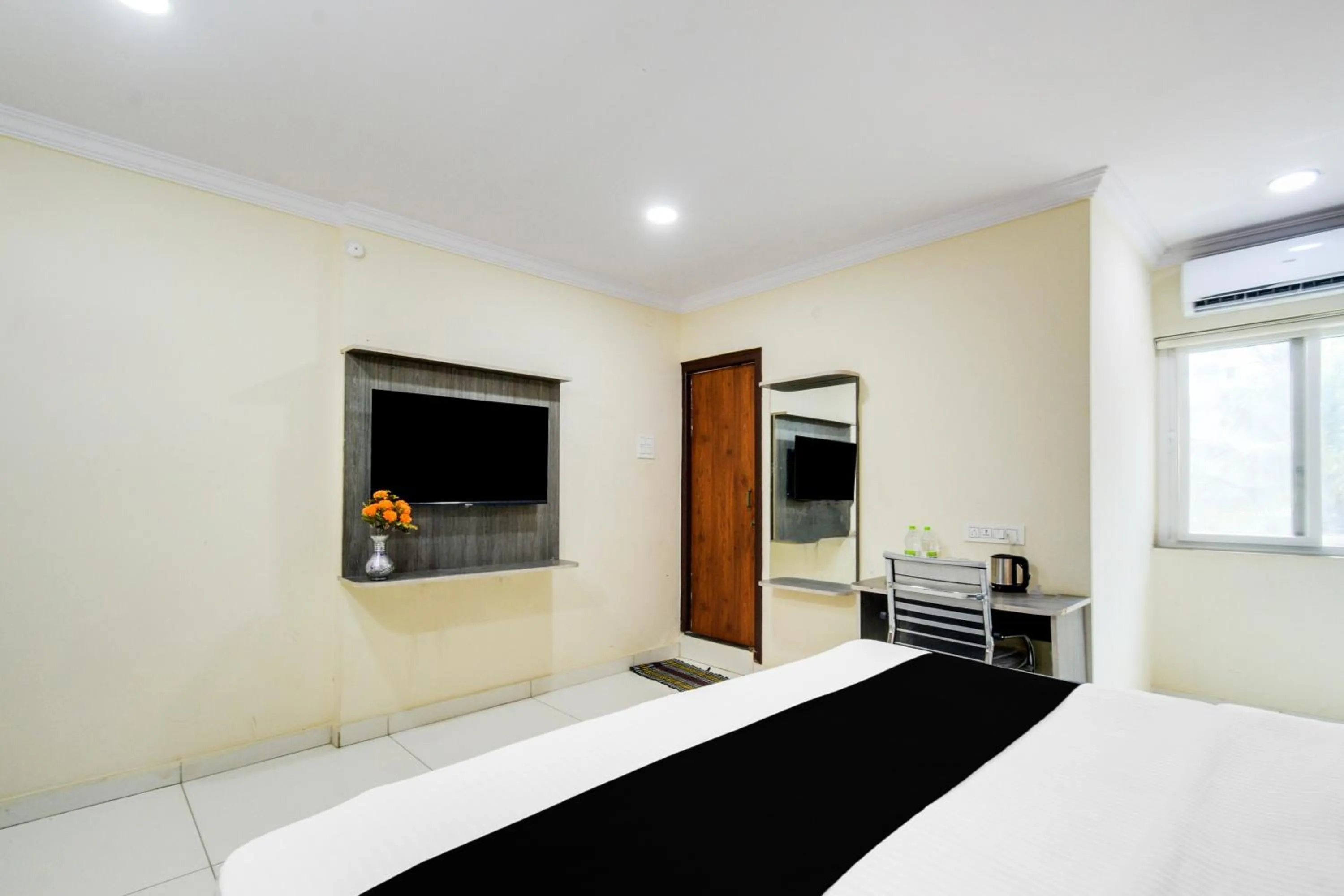 Bedroom, Bed in Townhouse Shamshabad Paradise Formerly Blue Petals Hotel