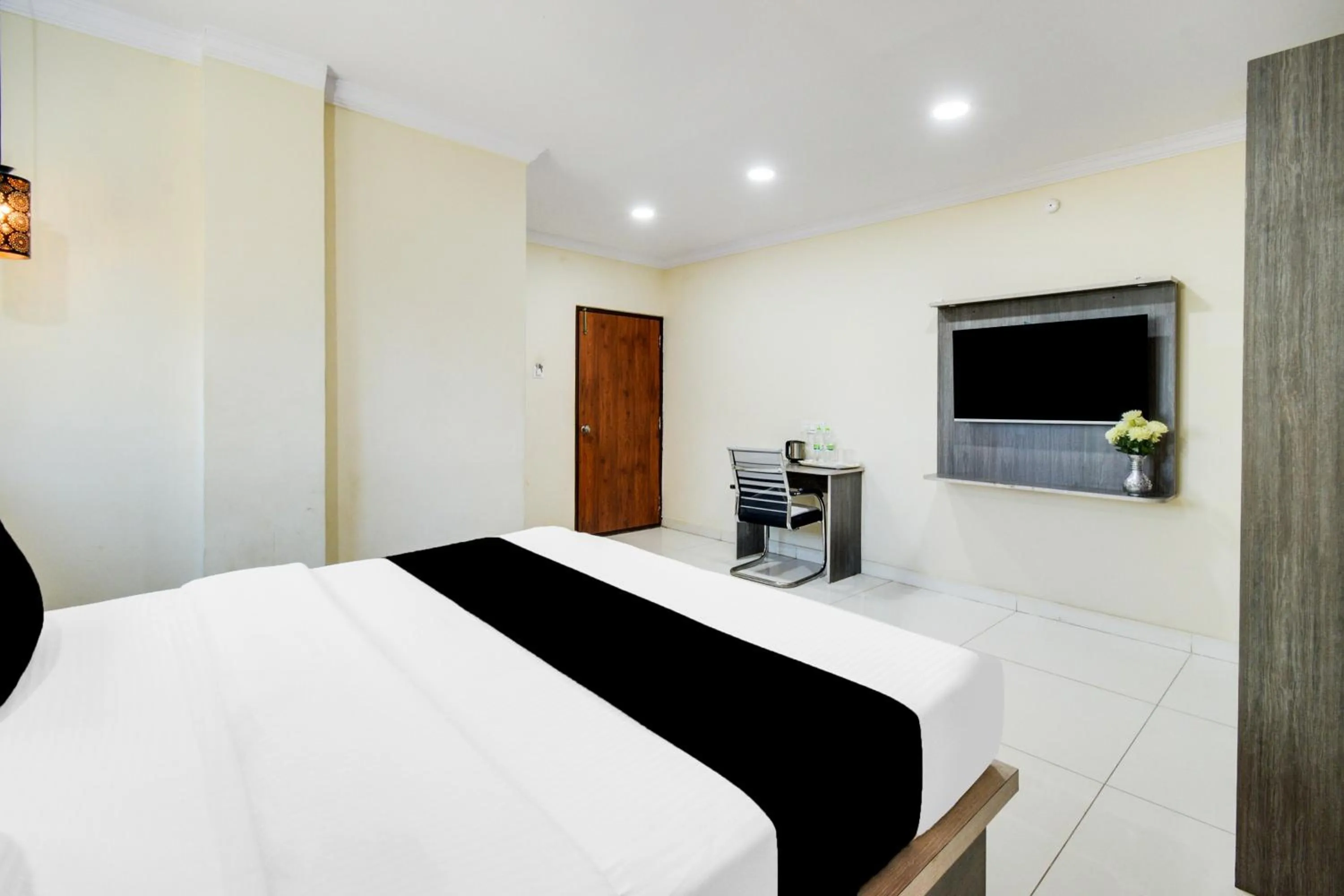 Bedroom, Bed in Townhouse Shamshabad Paradise Formerly Blue Petals Hotel