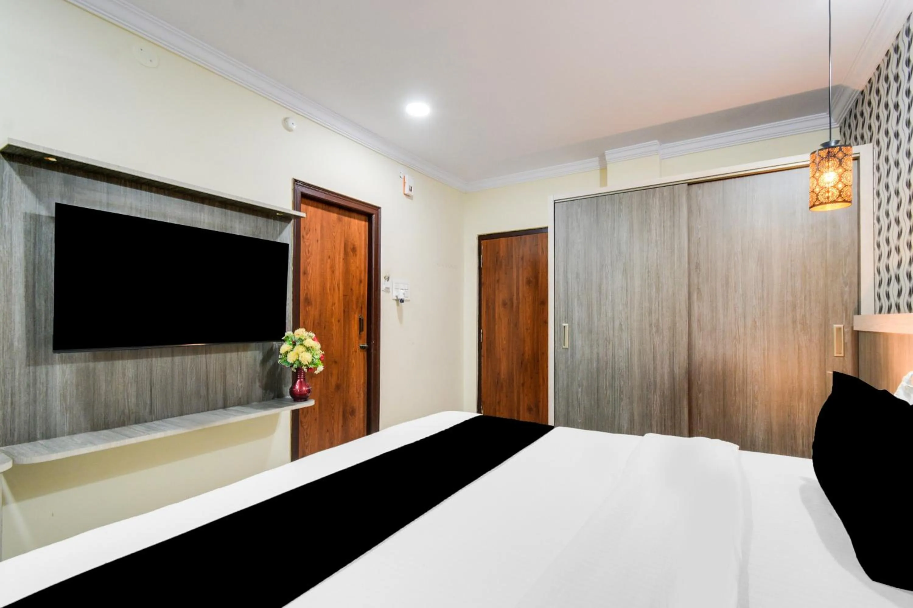 Bedroom, Bed in Townhouse Shamshabad Paradise Formerly Blue Petals Hotel