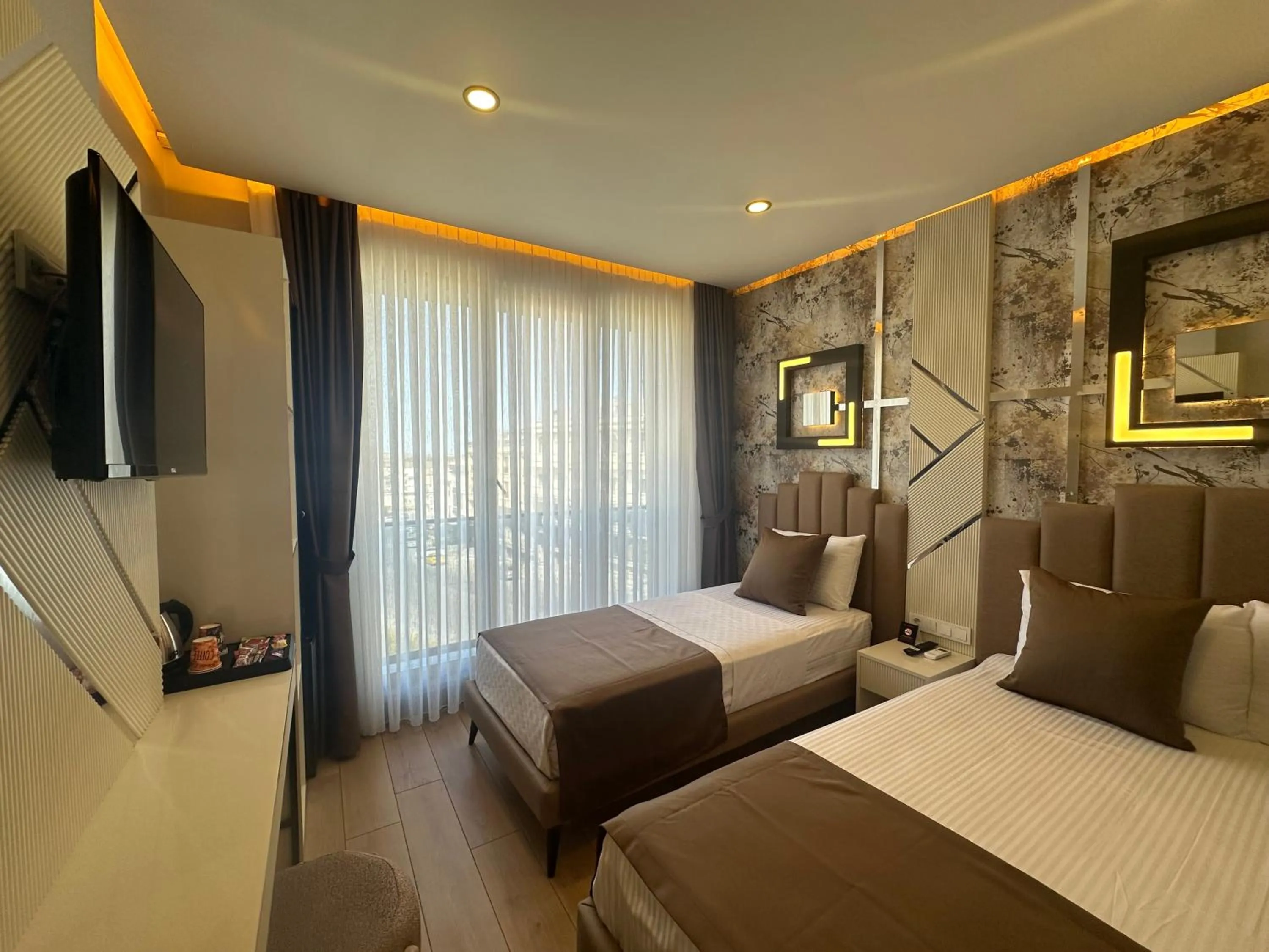 Photo of the whole room, Bed in Fourpoints Airport Hotel