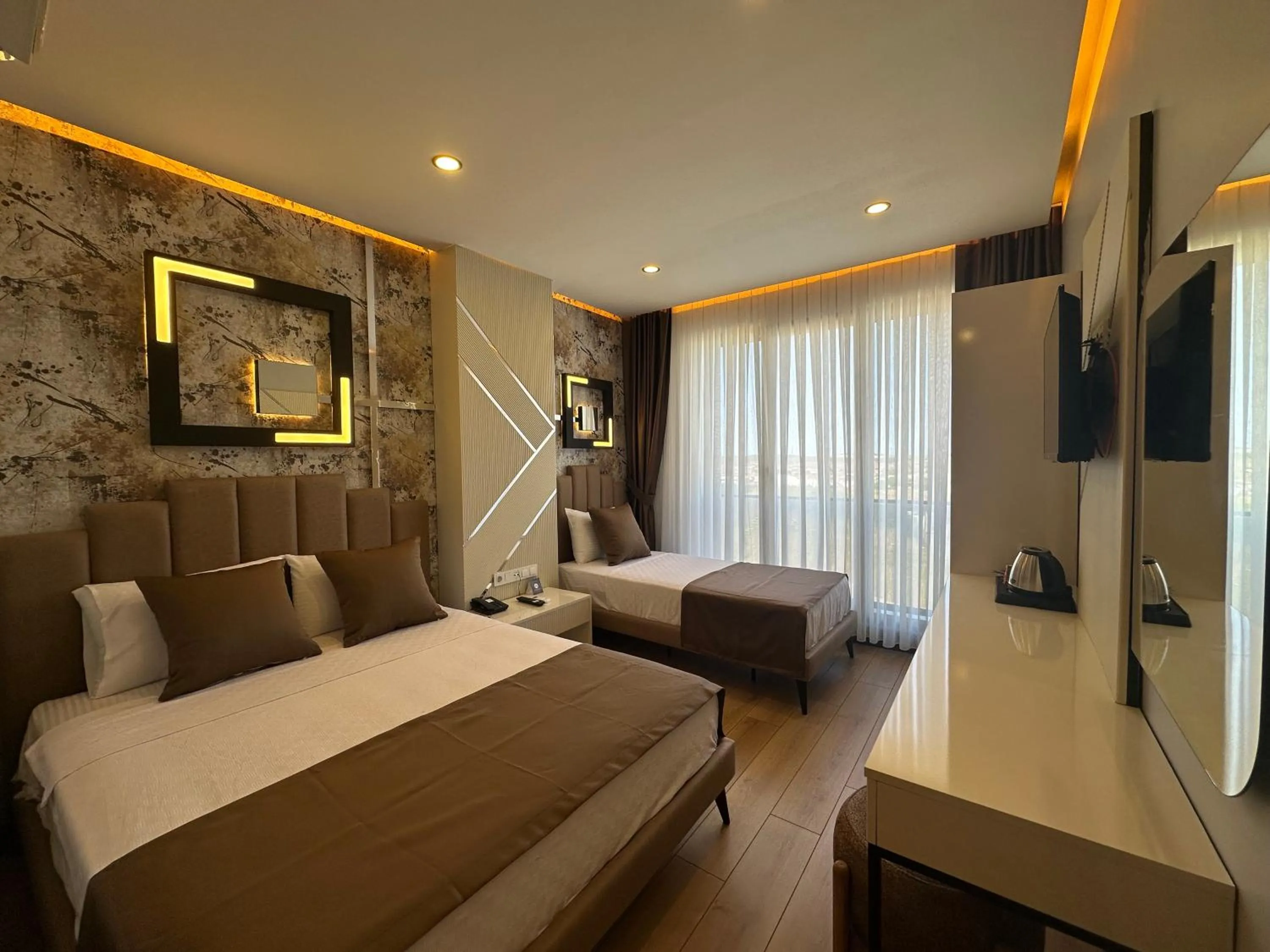 Photo of the whole room, Bed in Fourpoints Airport Hotel