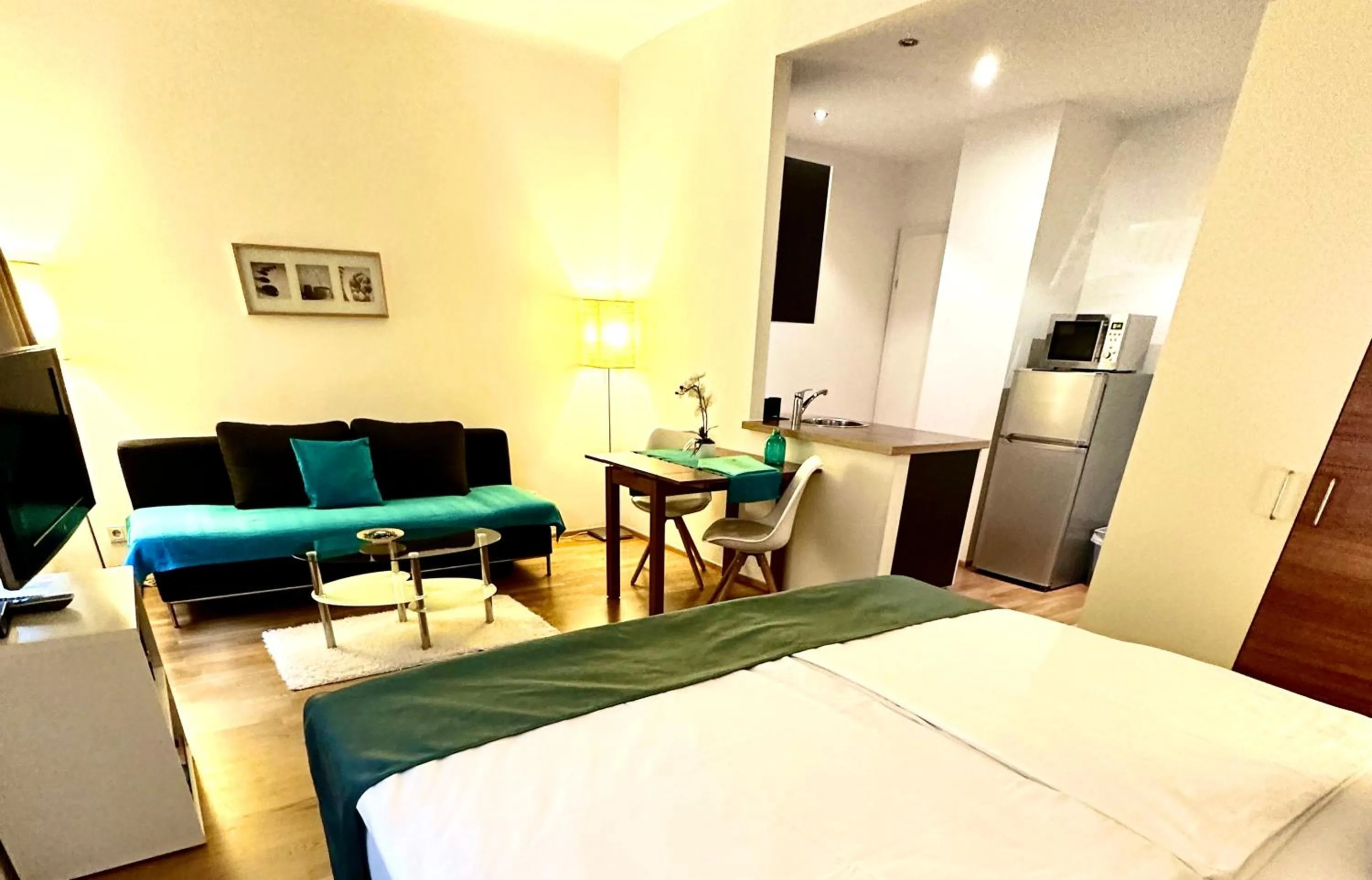 Living room, Bed in Home Sweet Apartments - A cozy welcome