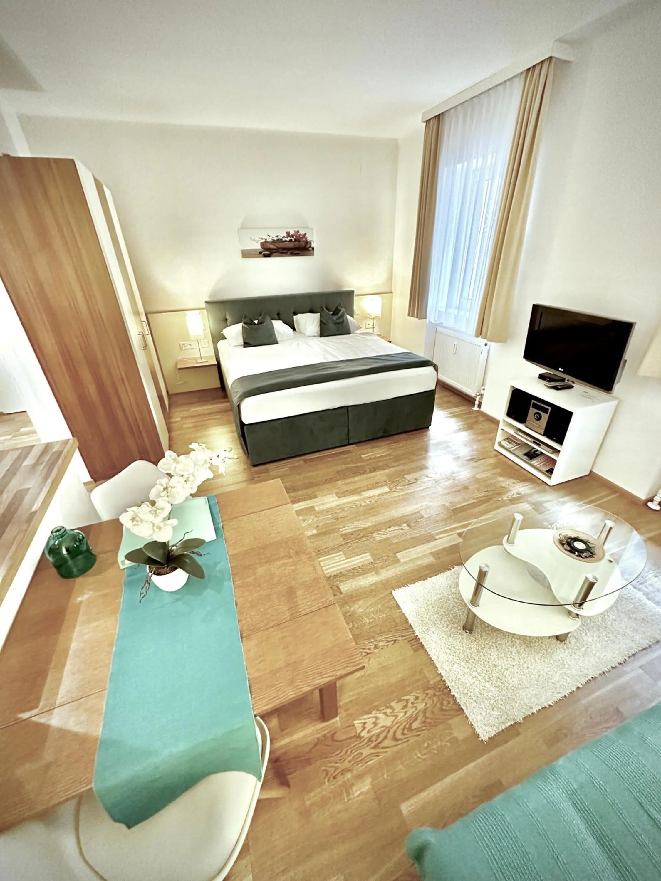 Bed in Home Sweet Apartments - A cozy welcome