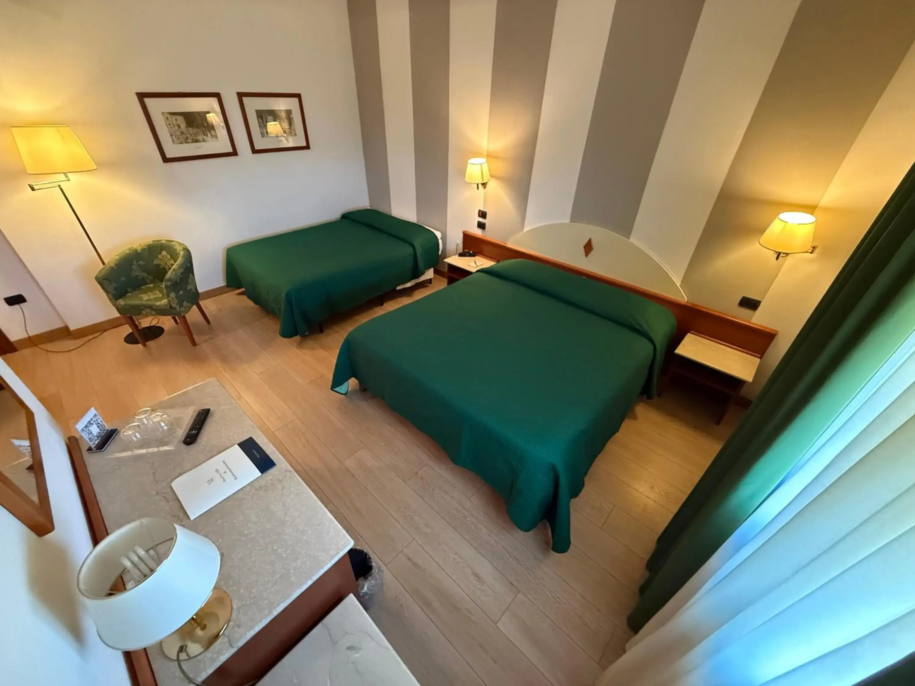 Triple Room in Hotel Le Ville Triple Room in Hotel Le Ville