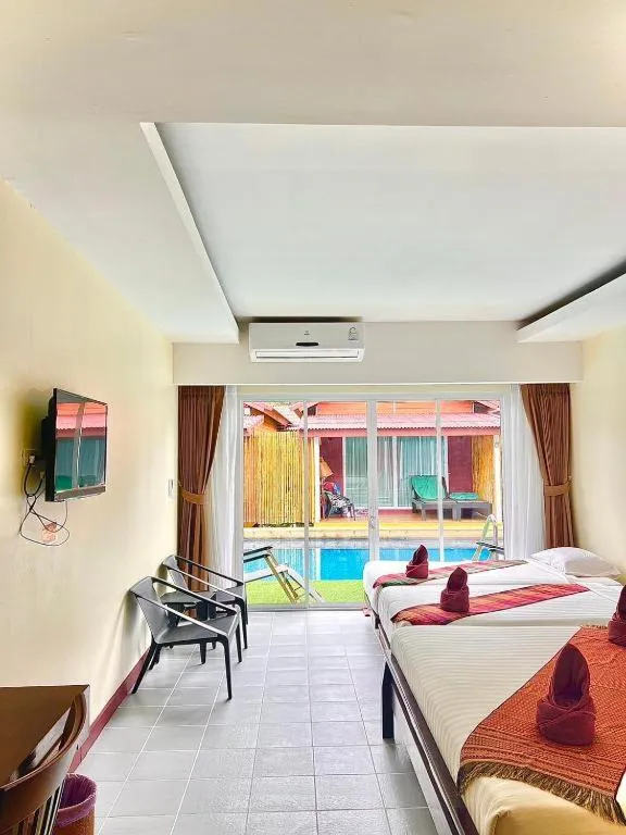 Communal lounge/ TV room, Bed in Lanta For Rest Boutique