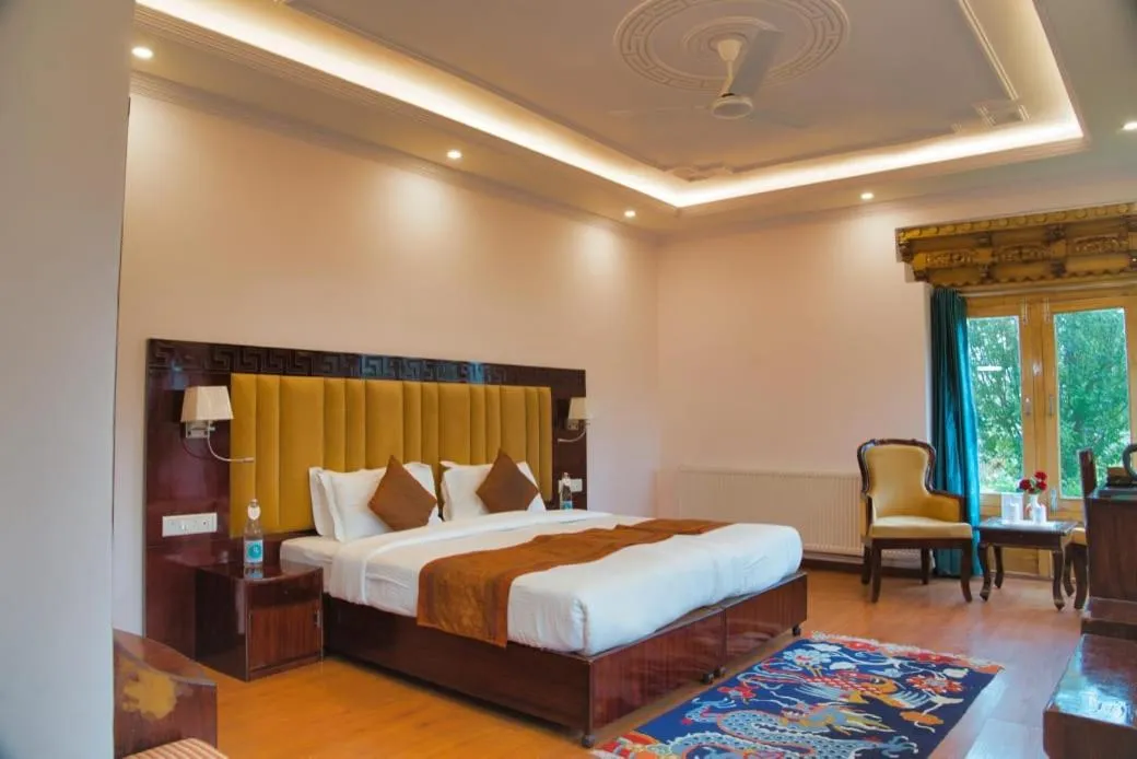 Seating area, Bed in Hotel Royal Ladakh, Leh