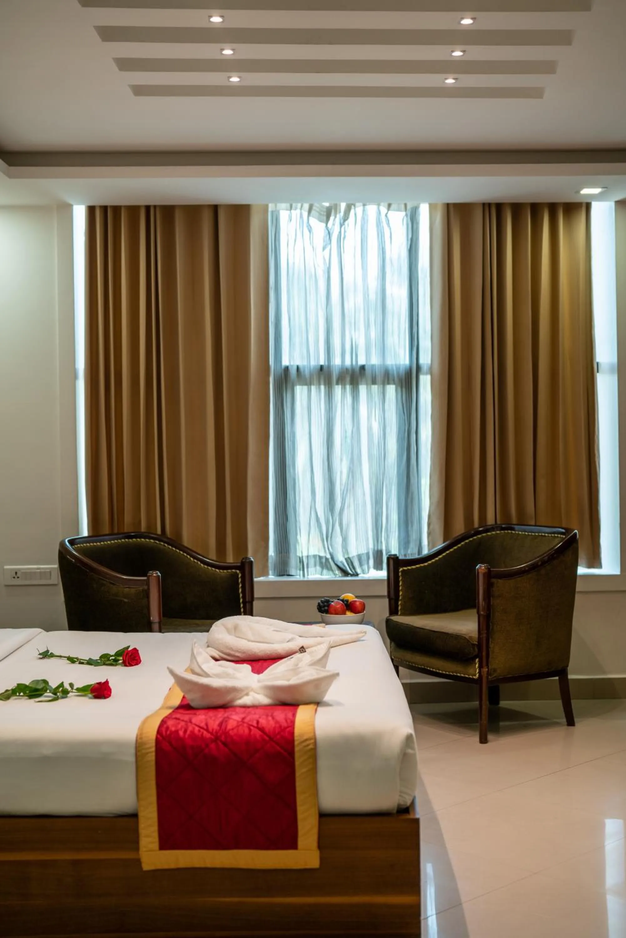 Bed in Royal Plaza Glitz Inn