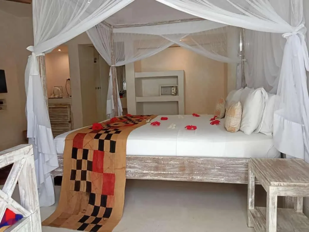 Bed in The Villa Luxury Suites Hotel