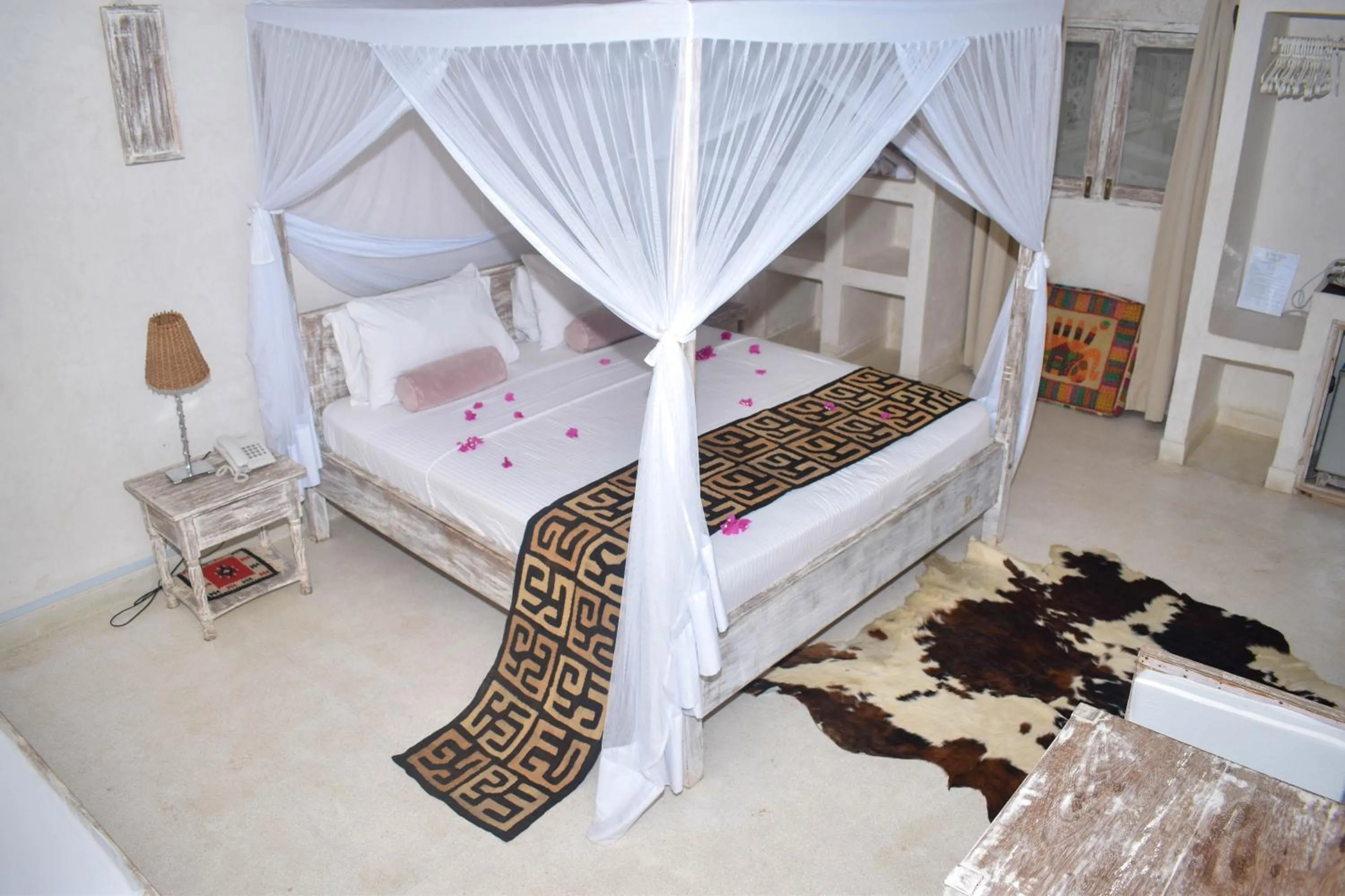 Bed in The Villa Luxury Suites Hotel
