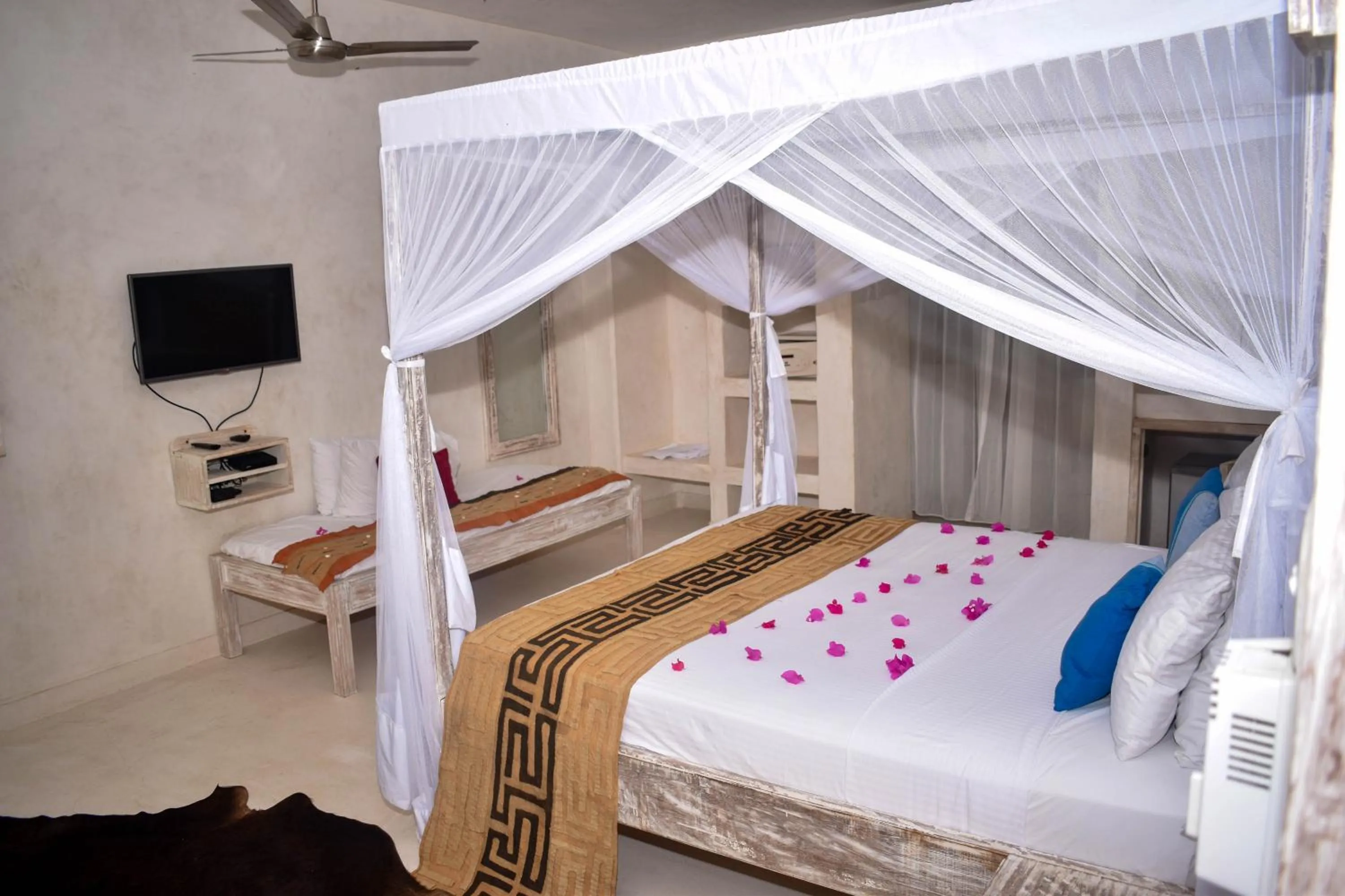 Bed in The Villa Luxury Suites Hotel