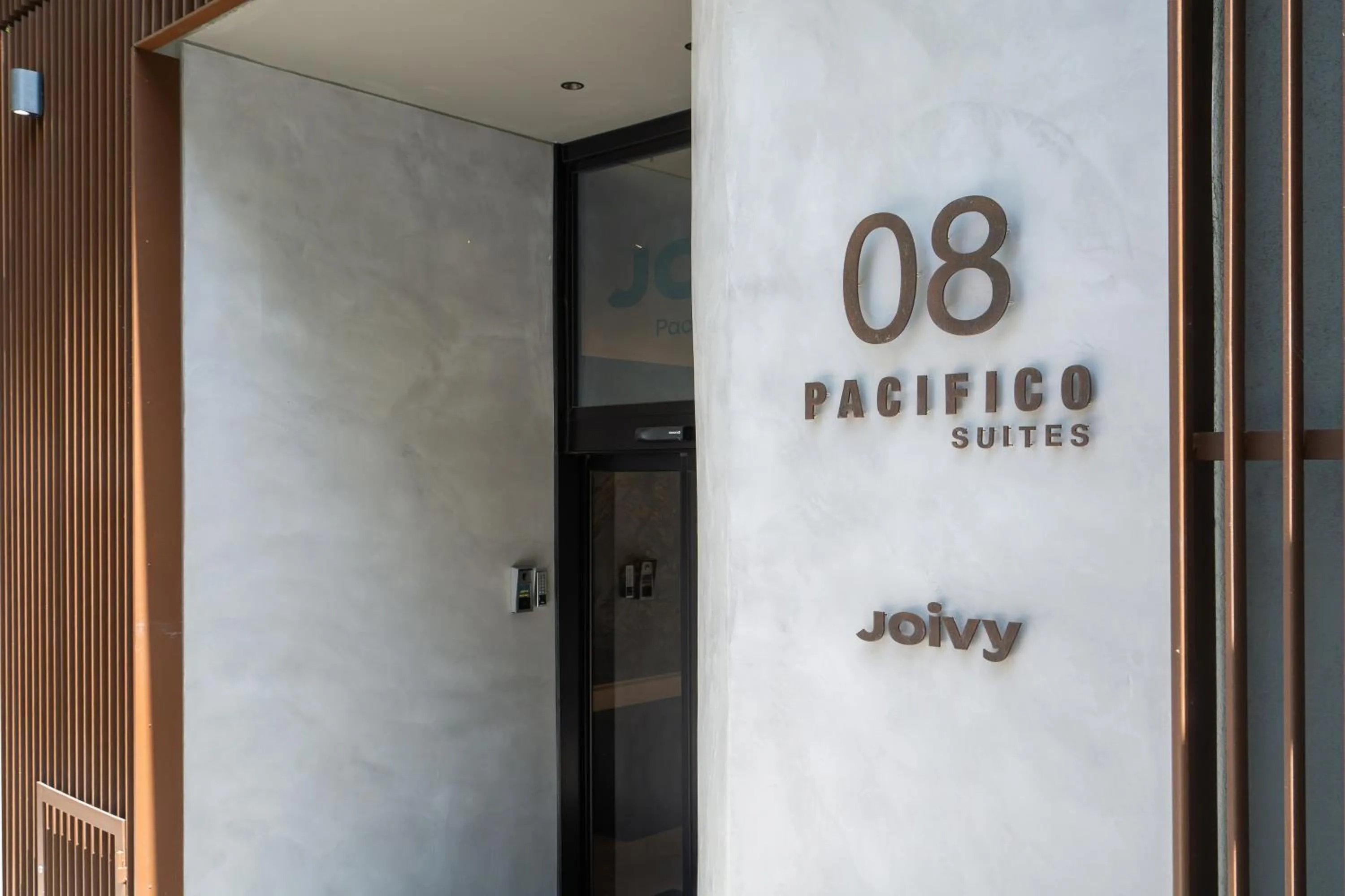 Property logo or sign in Pacifico Suites near Retiro